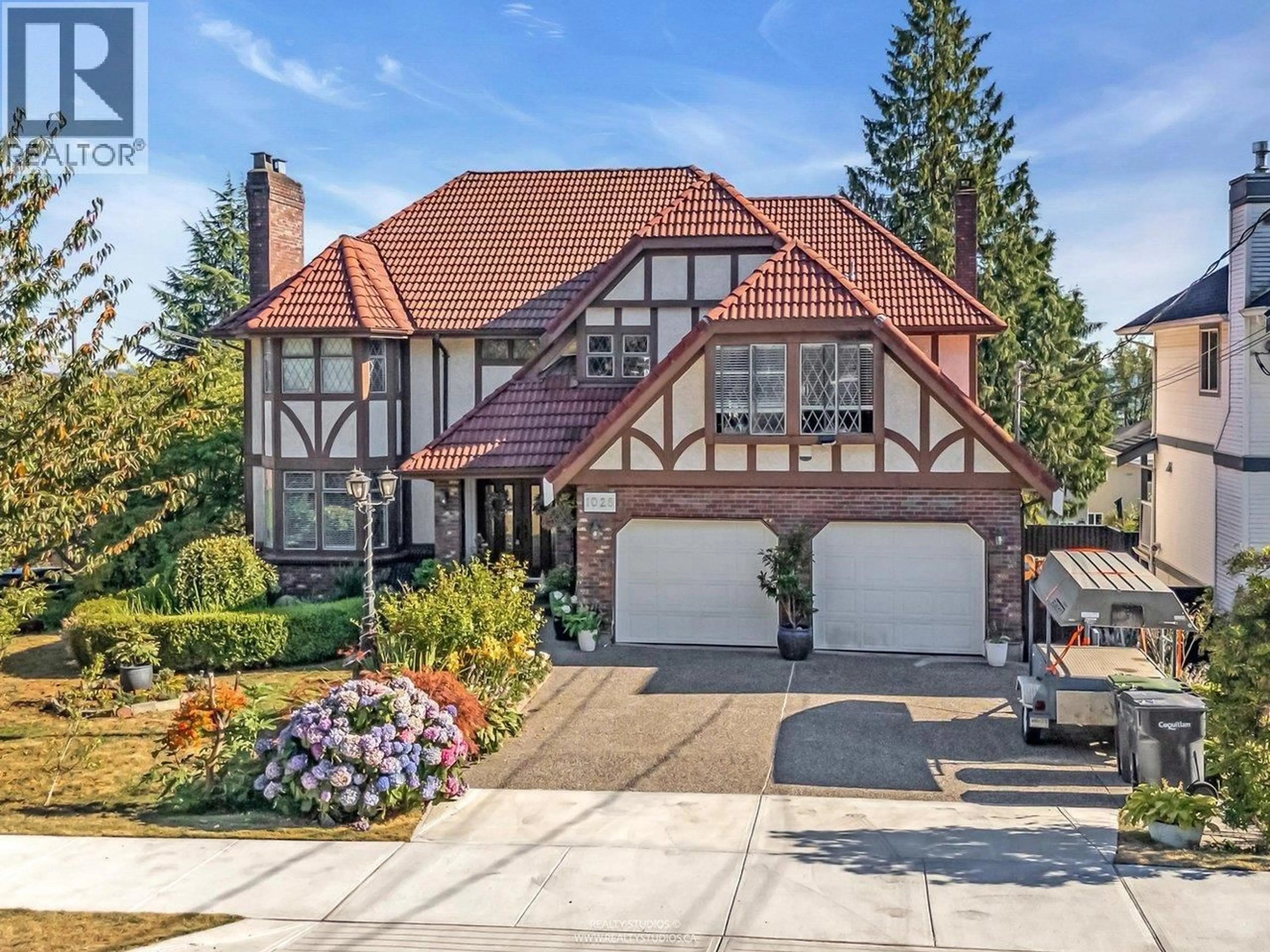 Home with brick exterior material, street for 1028 DANSEY AVENUE, Coquitlam British Columbia V3K3H1
