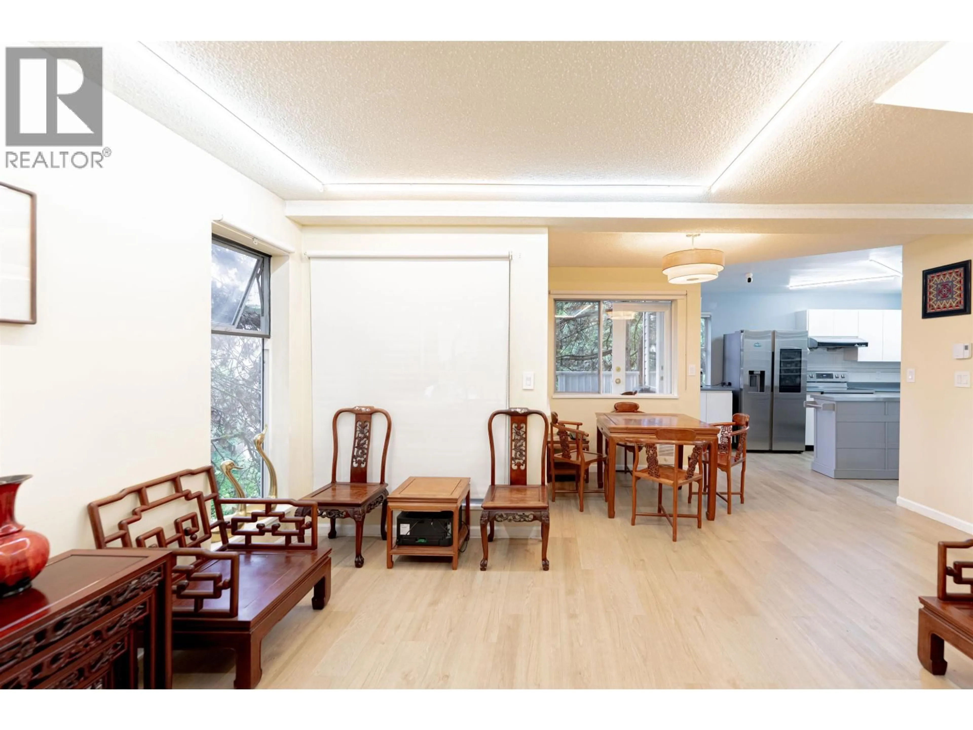 Dining room, wood/laminate floor for 21 - 7345 SANDBORNE AVENUE, Burnaby British Columbia V3N4W6