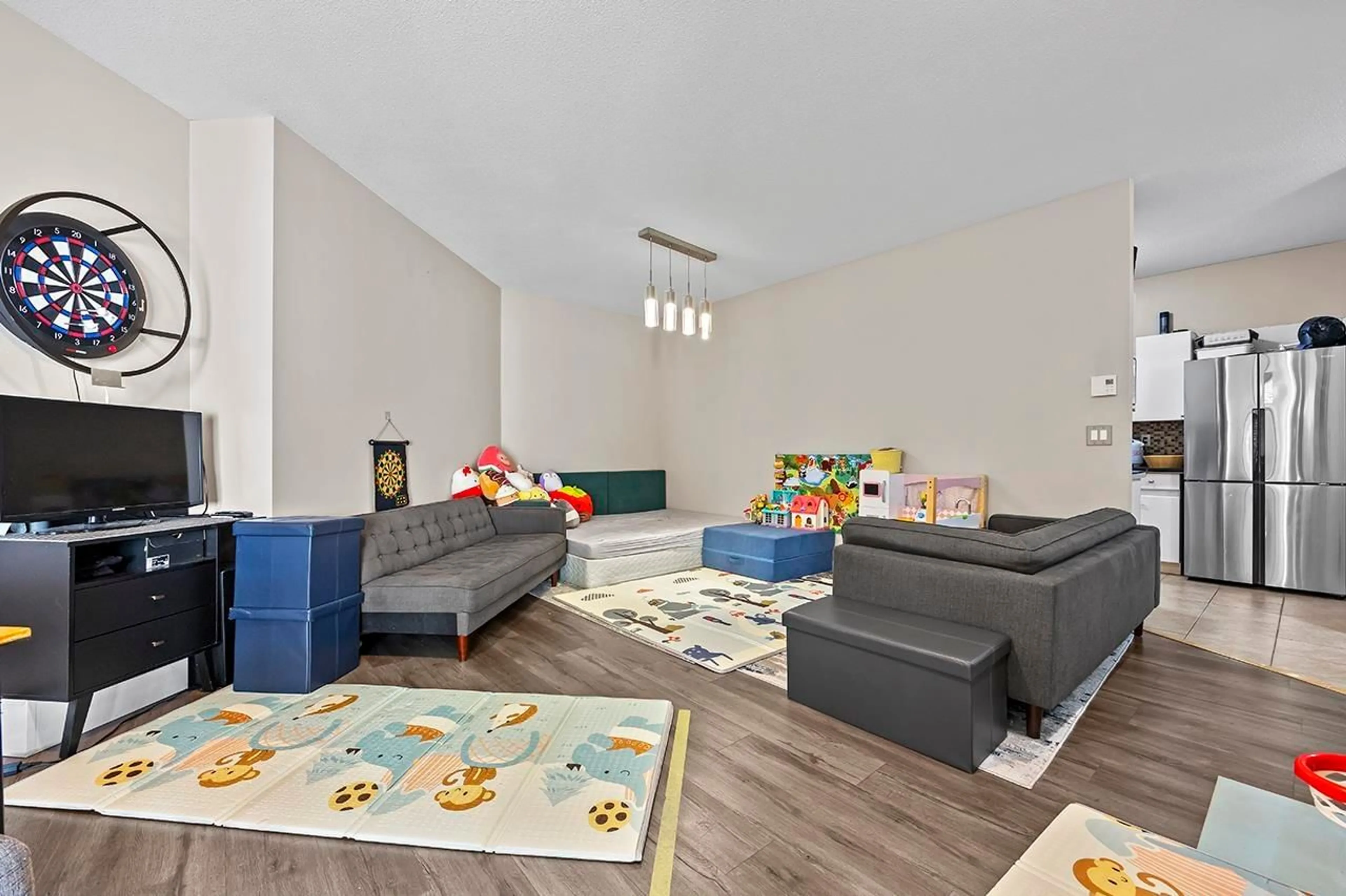 Living room with furniture, unknown for 108 - 14981 101A, Surrey British Columbia V3R0T1