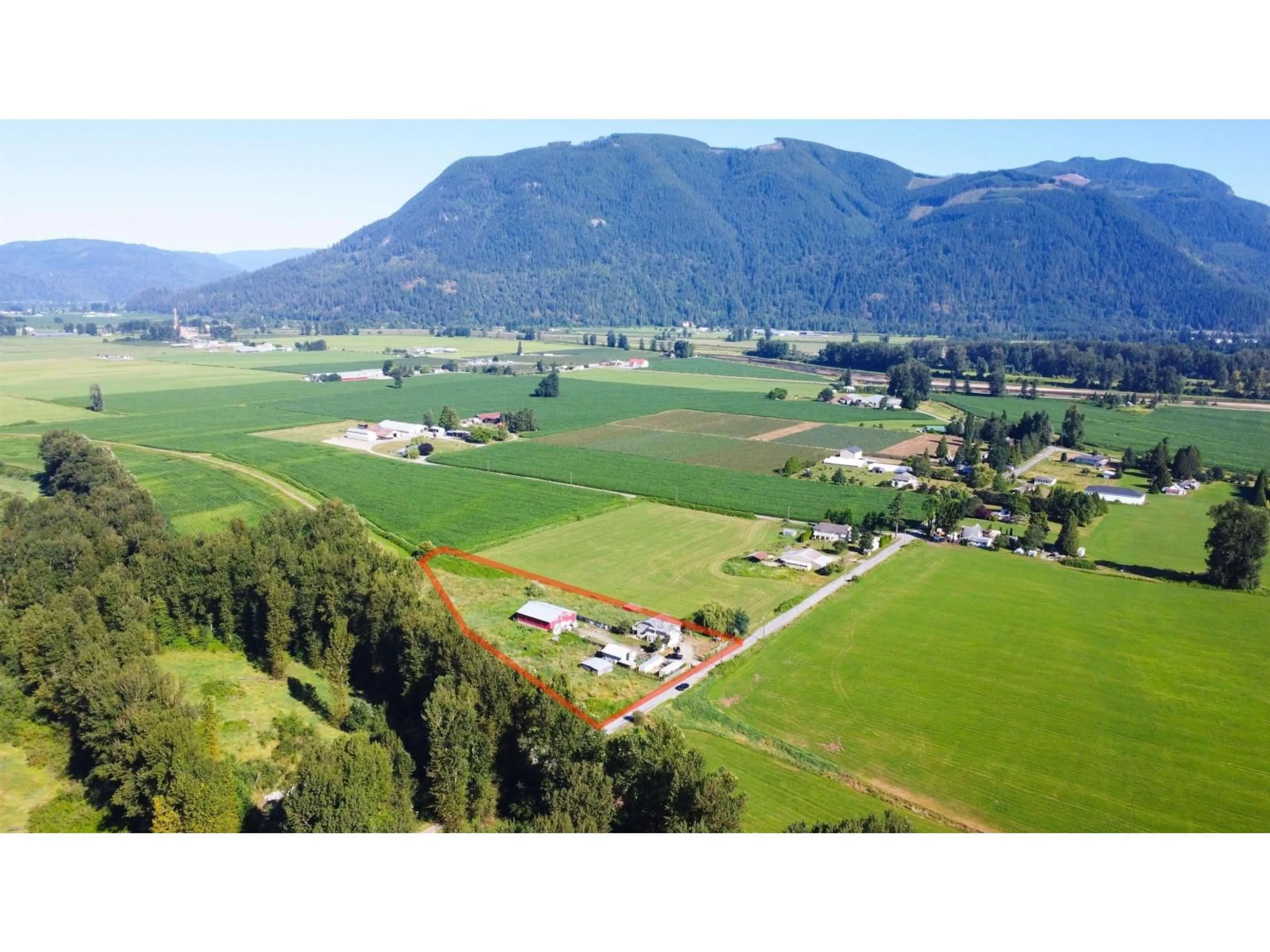 A pic from outside/outdoor area/front of a property/back of a property/a pic from drone, mountain view for 8309 THOMPSON, Mission British Columbia V0M1G0