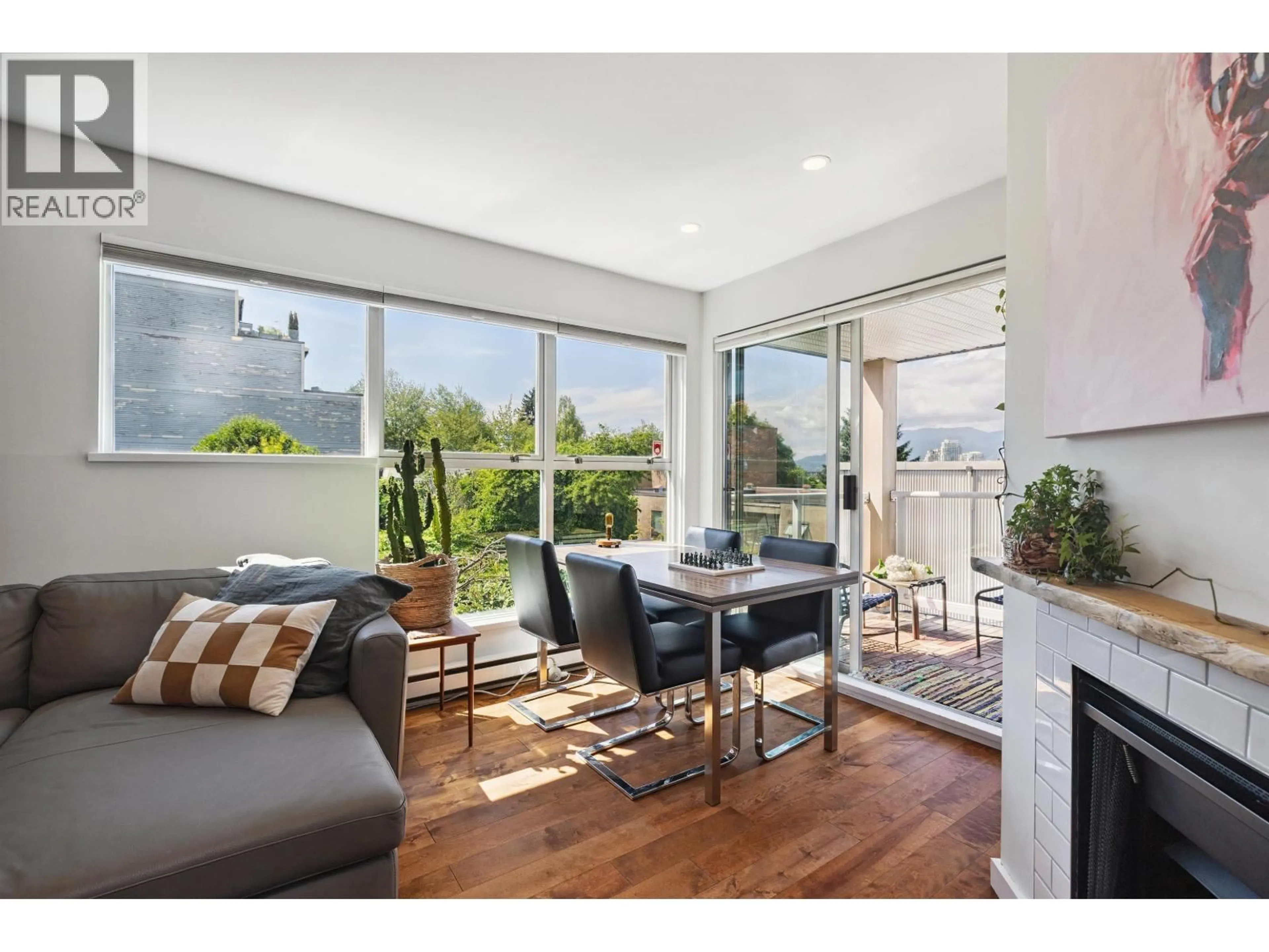 Living room with furniture, wood/laminate floor for 105 - 953 8TH AVENUE, Vancouver British Columbia V5Z1E4