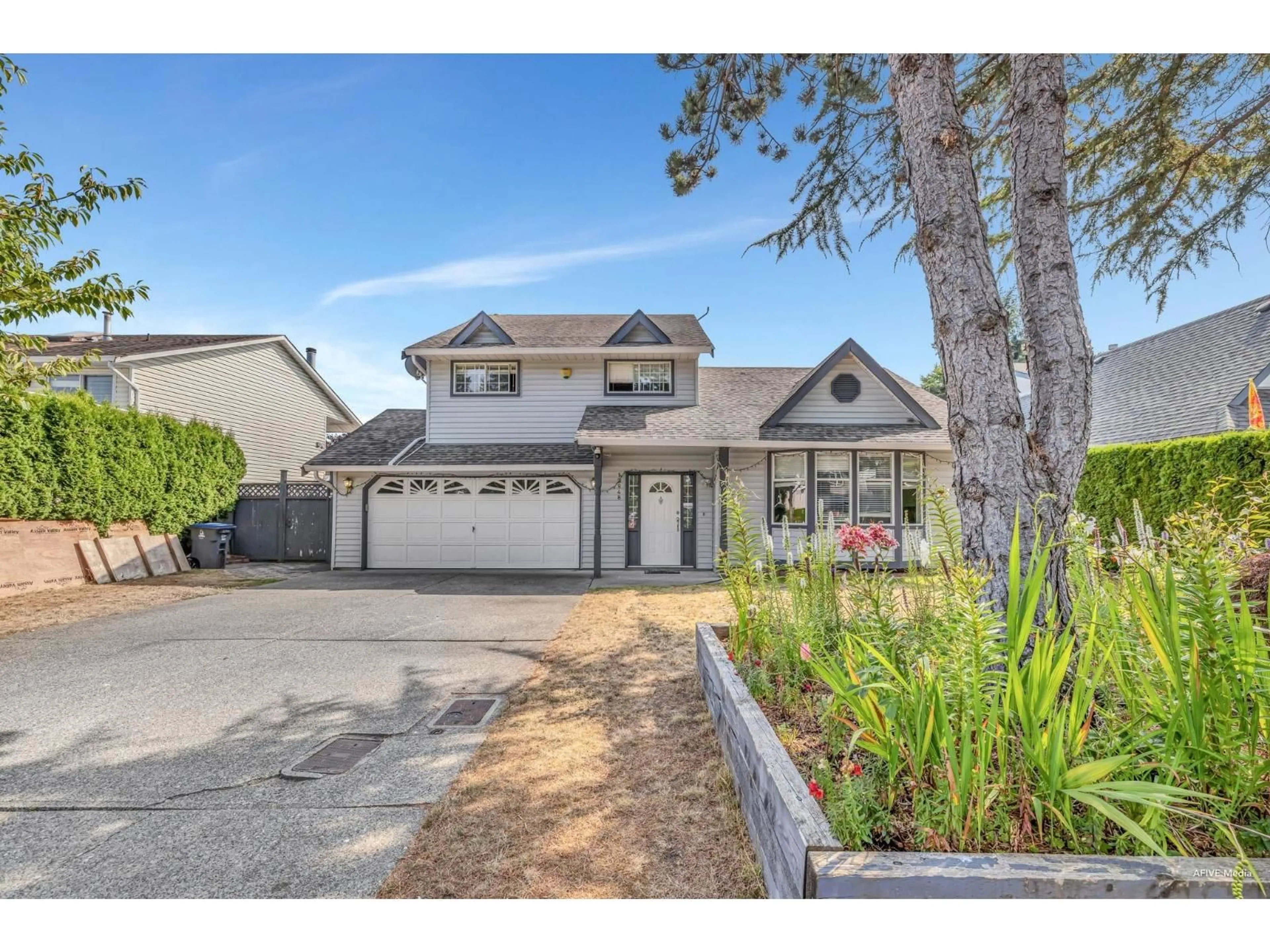 Home with vinyl exterior material, street for 12848 65, Surrey British Columbia V3W9P4