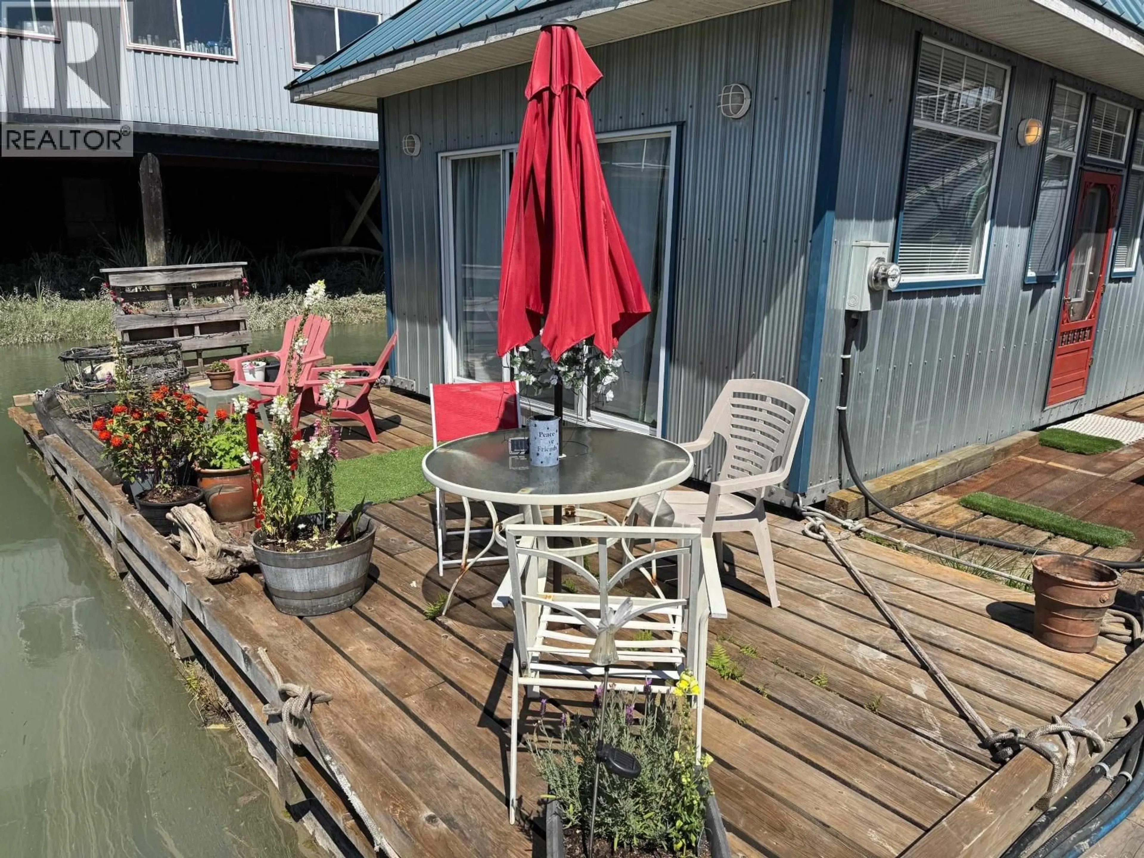 Patio, water/lake/river/ocean view for 23220 DYKE ROAD, Richmond British Columbia V6V1E2