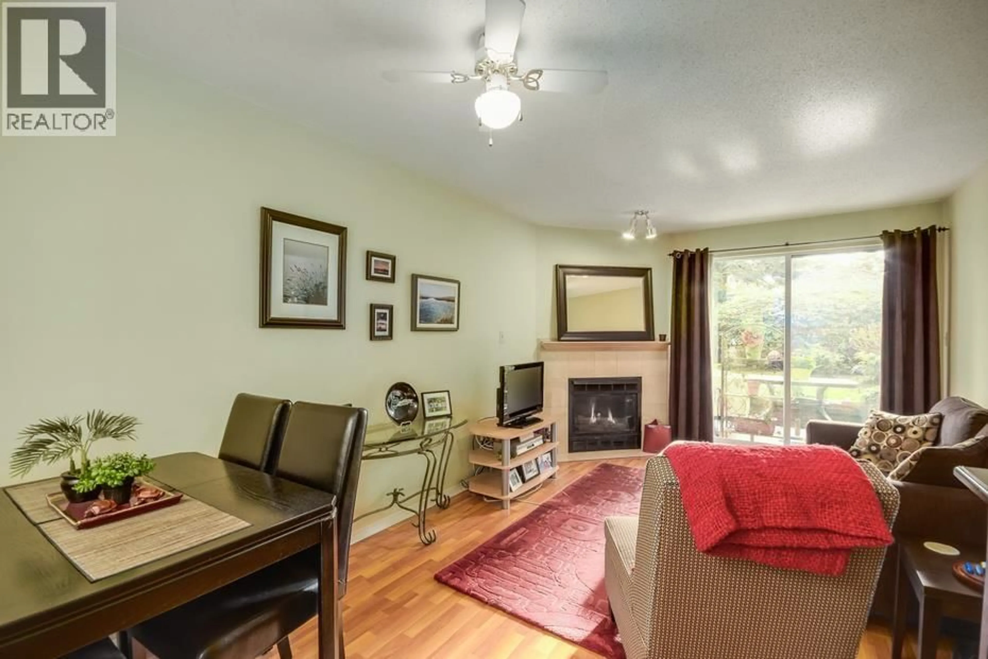 Living room with furniture, wood/laminate floor for 109 - 1187 PIPELINE ROAD, Coquitlam British Columbia V3B4R9