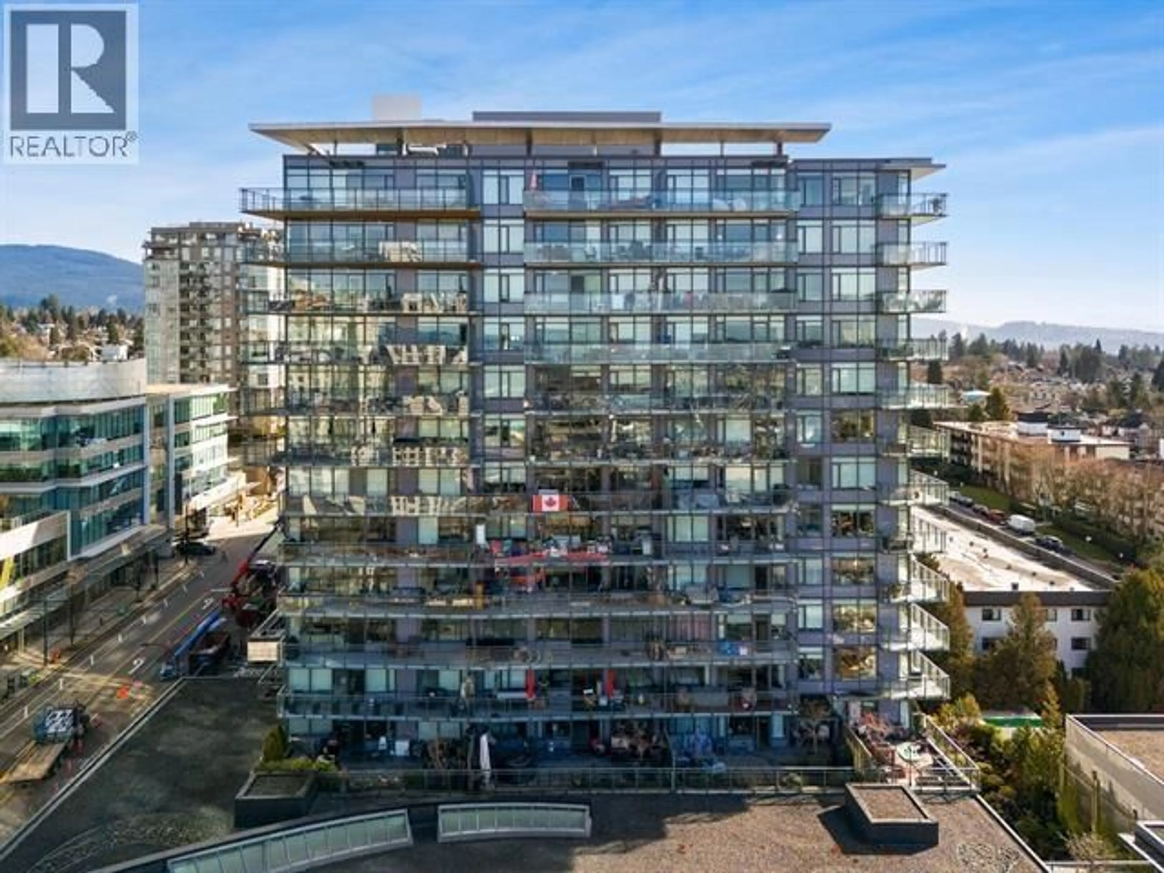 A pic from outside/outdoor area/front of a property/back of a property/a pic from drone, city buildings view from balcony for 703 - 111 13TH STREET, North Vancouver British Columbia V7L0C7