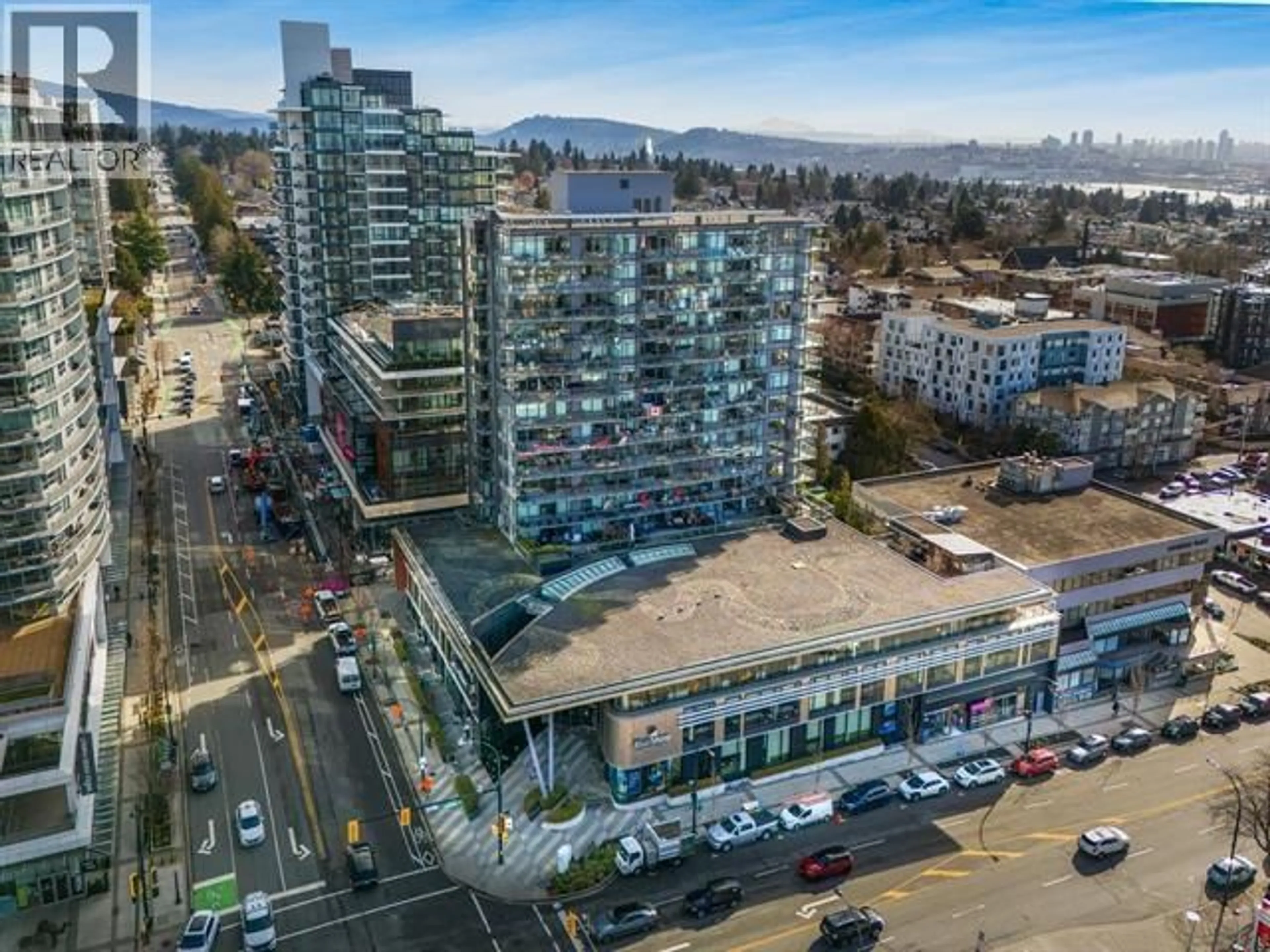 A pic from outside/outdoor area/front of a property/back of a property/a pic from drone, city buildings view from balcony for 703 - 111 13TH STREET, North Vancouver British Columbia V7L0C7