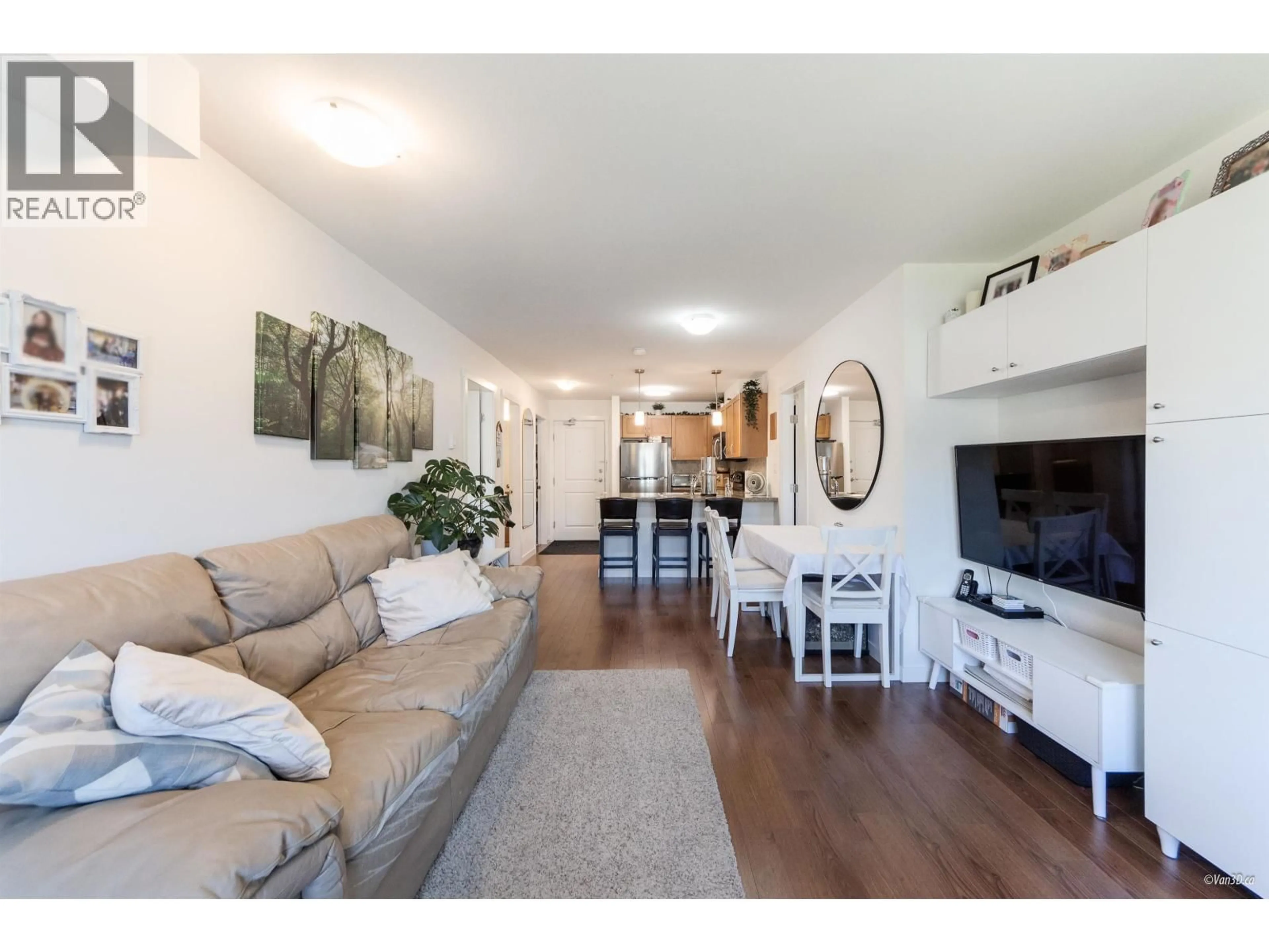 Living room with furniture, wood/laminate floor for 302 - 2373 ATKINS AVENUE, Port Coquitlam British Columbia V3C1Y7