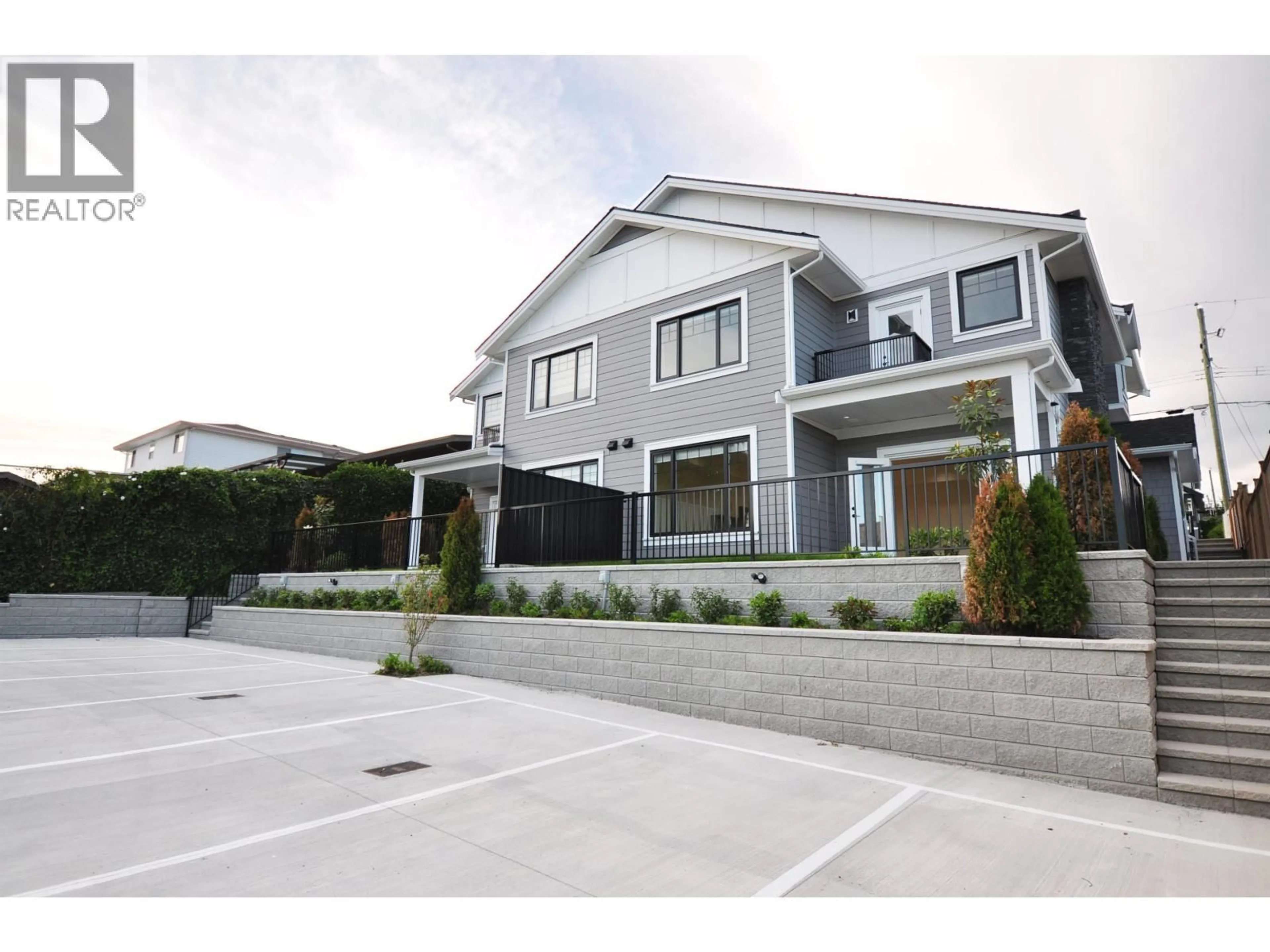 Home with vinyl exterior material, street for 104 - 1138 DANSEY AVENUE, Coquitlam British Columbia V3K3H4