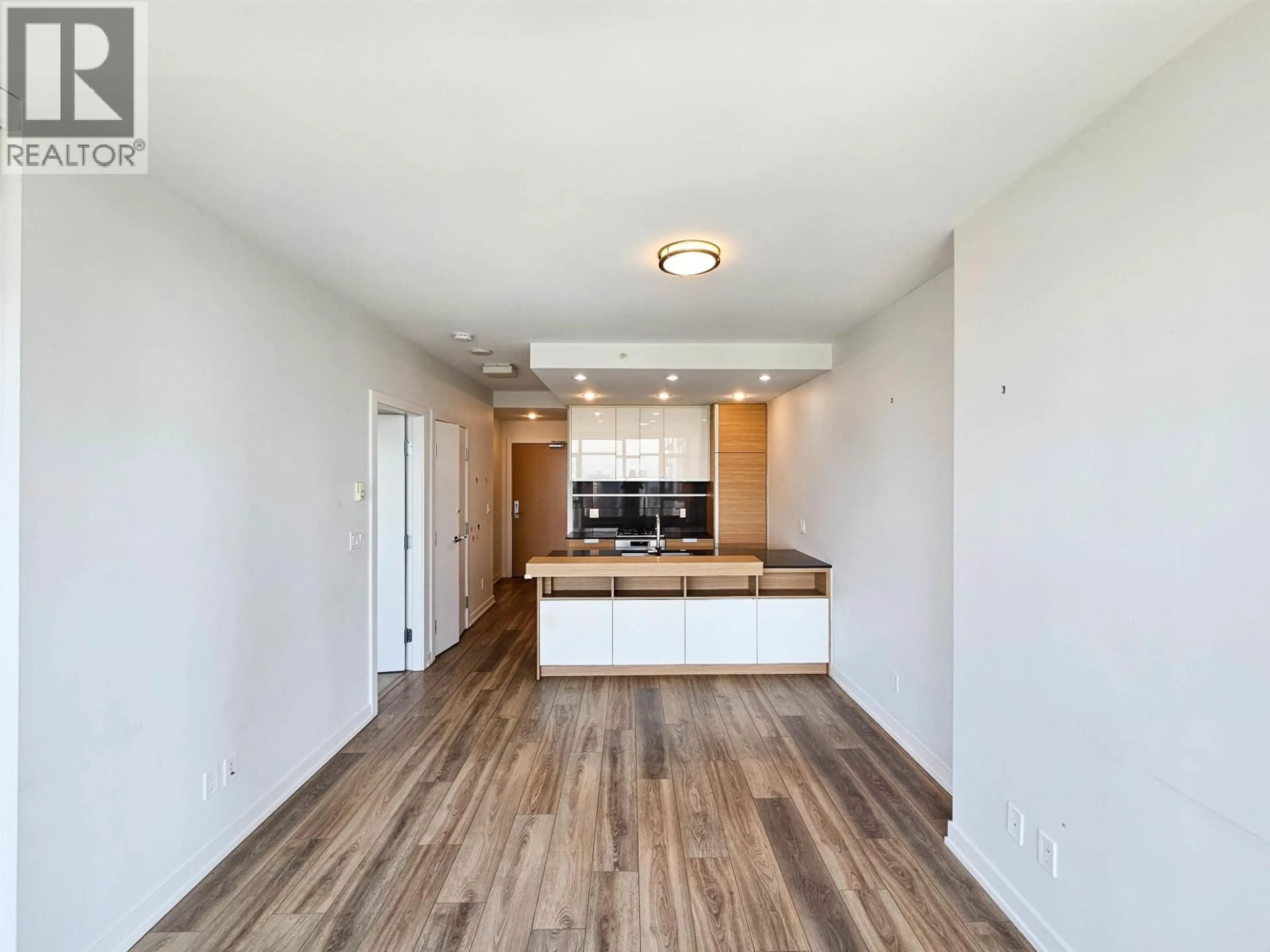 Open concept kitchen, wood/laminate floor for 2602 - 4688 KINGSWAY, Burnaby British Columbia V5H0E9