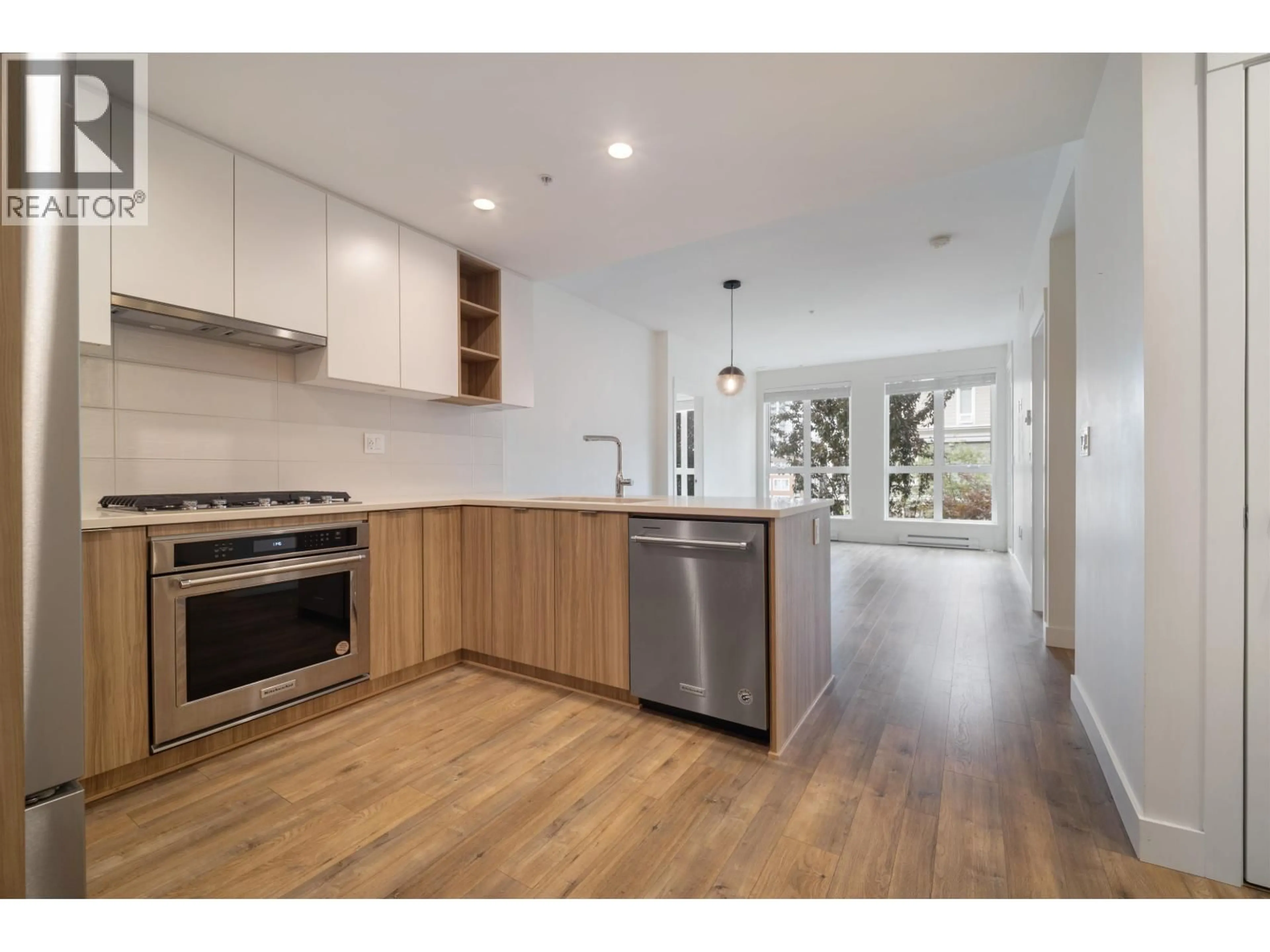 Open concept kitchen, wood/laminate floor for 210 - 750 DOGWOOD STREET, Coquitlam British Columbia V3J4B7