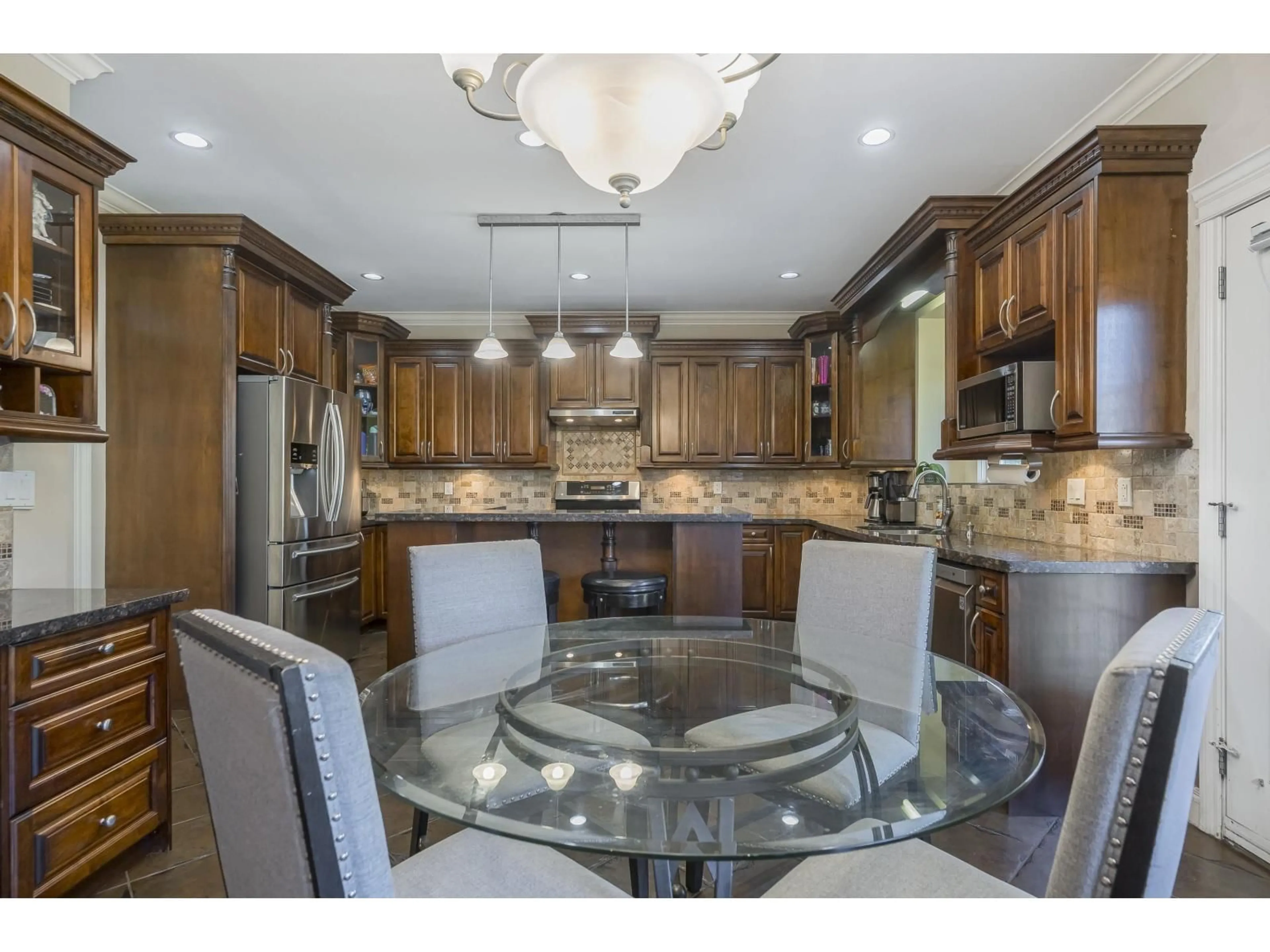 Open concept kitchen, ceramic/tile floor for 21179 83A, Langley British Columbia V2Y0C4