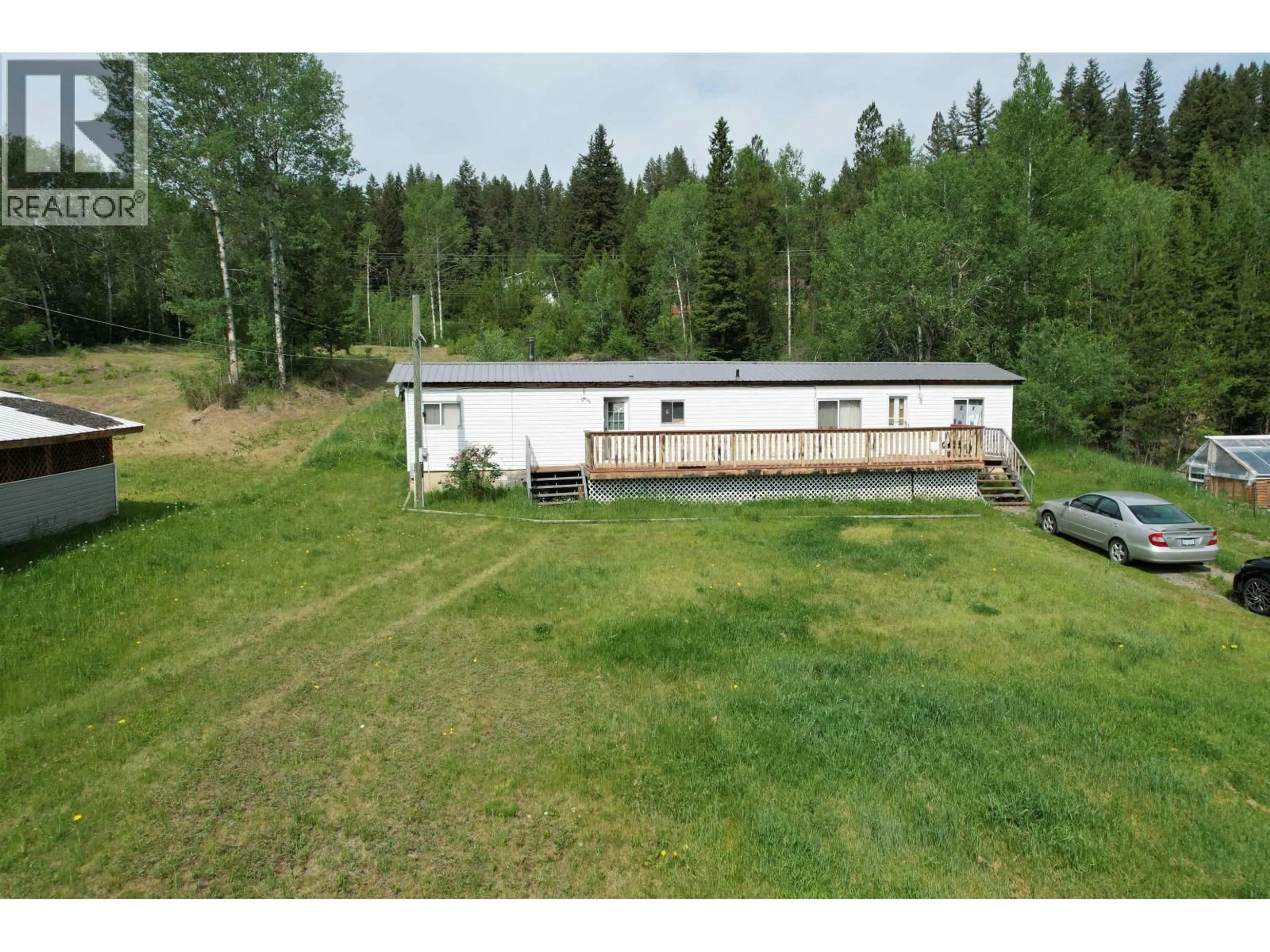 A pic from outside/outdoor area/front of a property/back of a property/a pic from drone, unknown for 5450 KENNEDY ROAD, 100 Mile House British Columbia V0K2E1