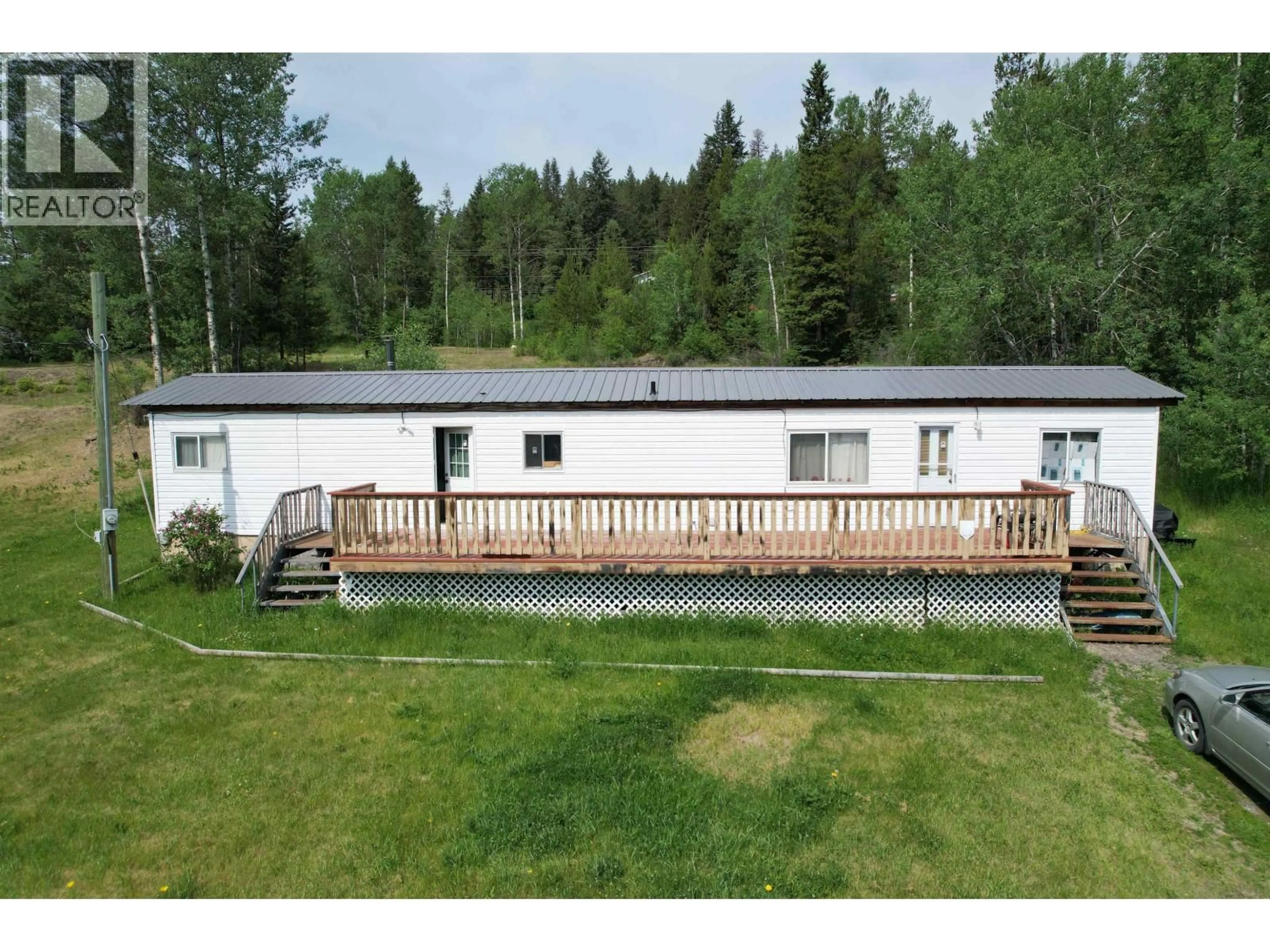 A pic from outside/outdoor area/front of a property/back of a property/a pic from drone, building for 5450 KENNEDY ROAD, 100 Mile House British Columbia V0K2E1