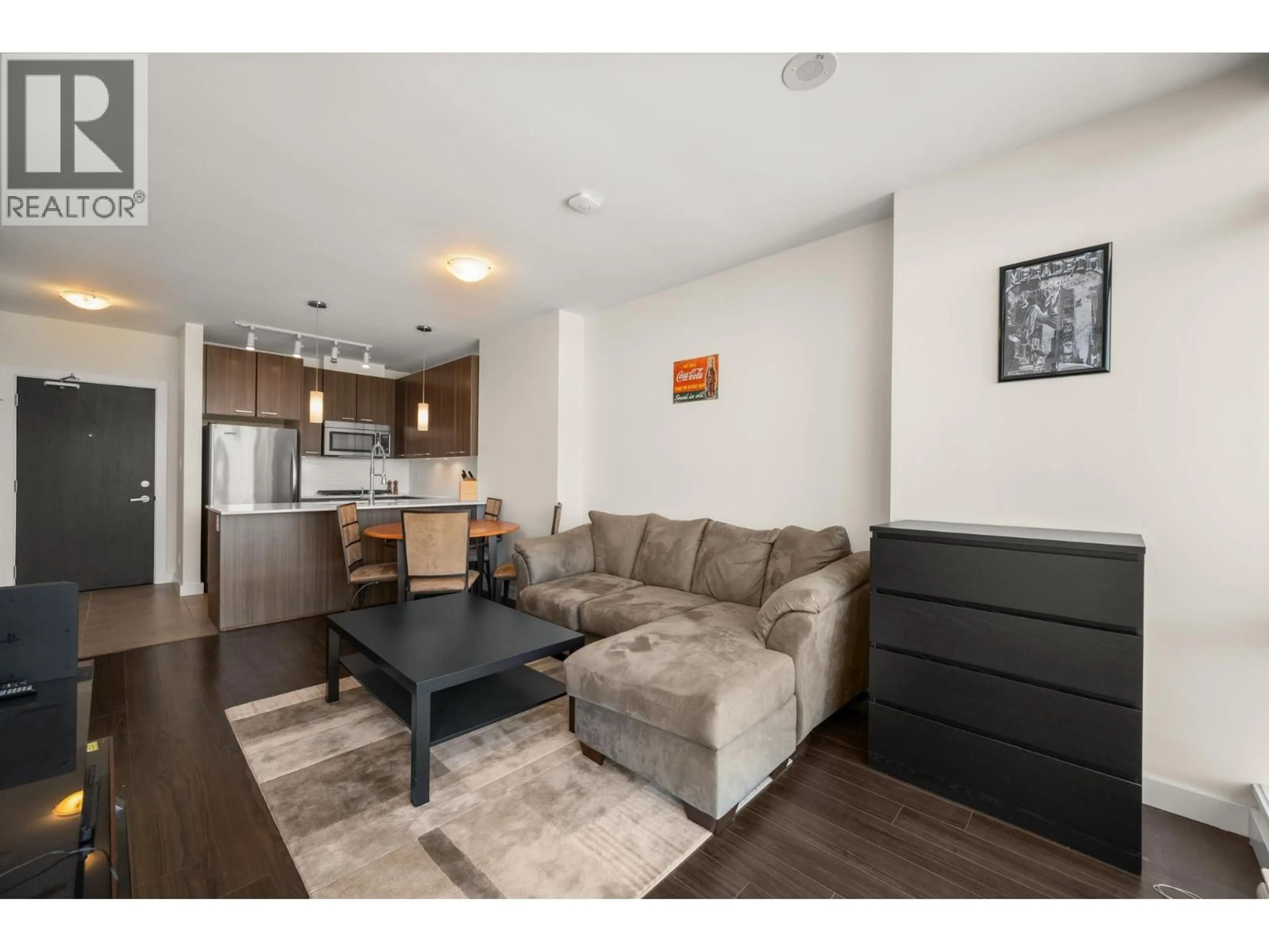 Living room with furniture, wood/laminate floor for 908 - 2955 ATLANTIC AVENUE, Coquitlam British Columbia V3B0H9