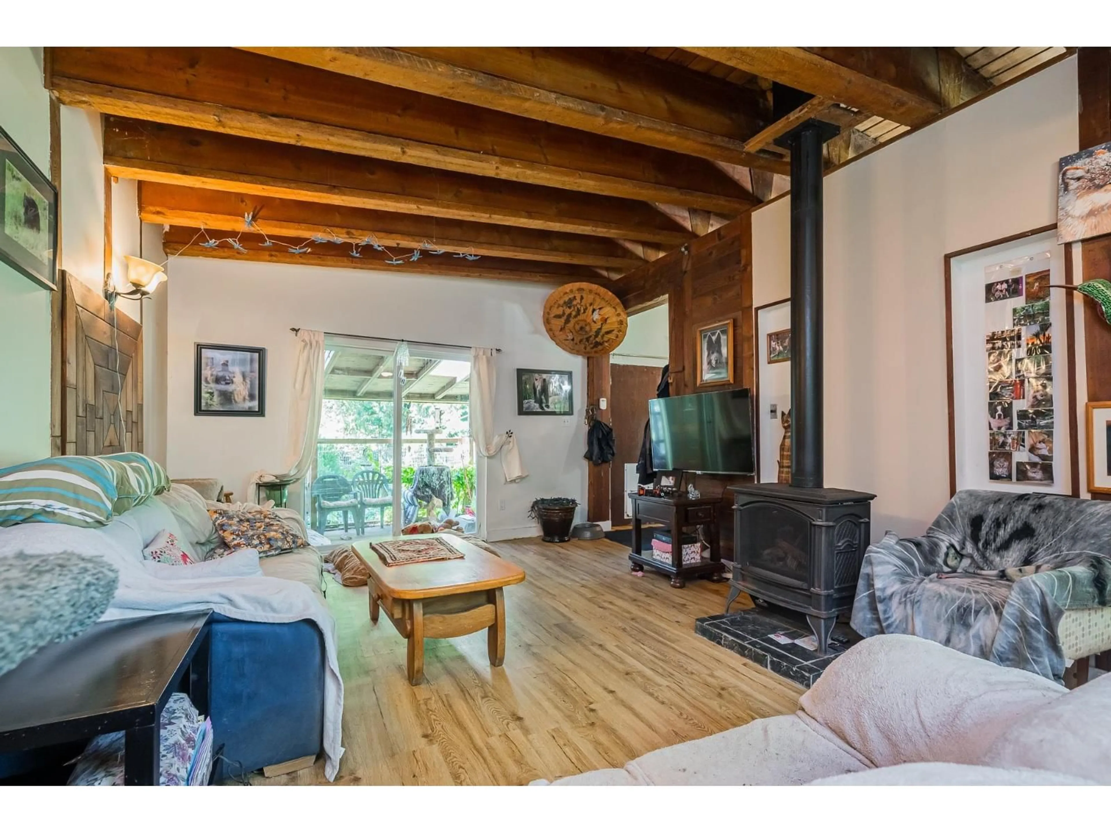 Living room with furniture, wood/laminate floor for 50802 WINONA ROAD, Sardis - Chwk River Valley British Columbia V4Z1B6