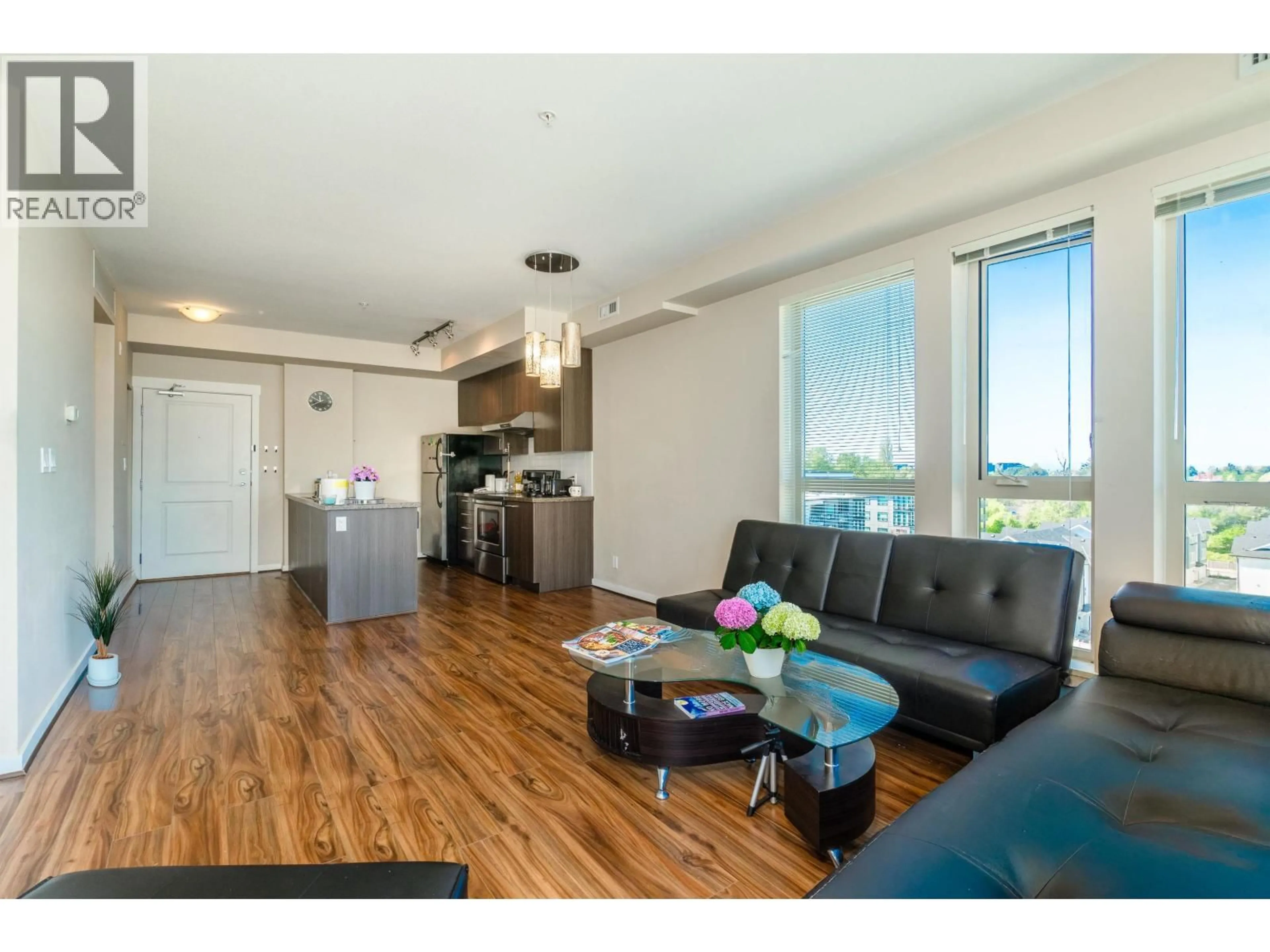 Living room with furniture, wood/laminate floor for 795 - 4133 STOLBERG STREET, Richmond British Columbia V6X0J3