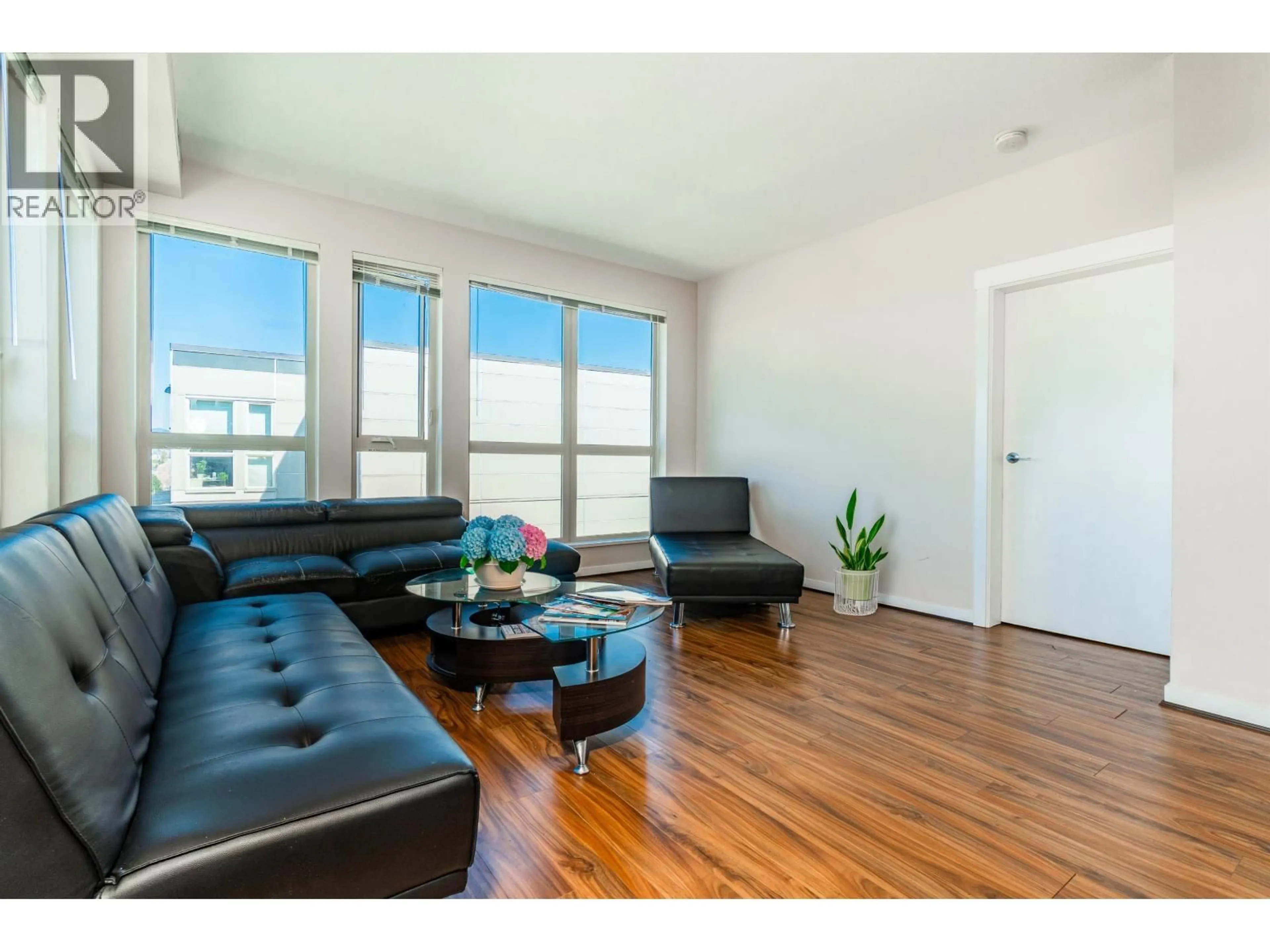 Living room with furniture, wood/laminate floor for 795 - 4133 STOLBERG STREET, Richmond British Columbia V6X0J3