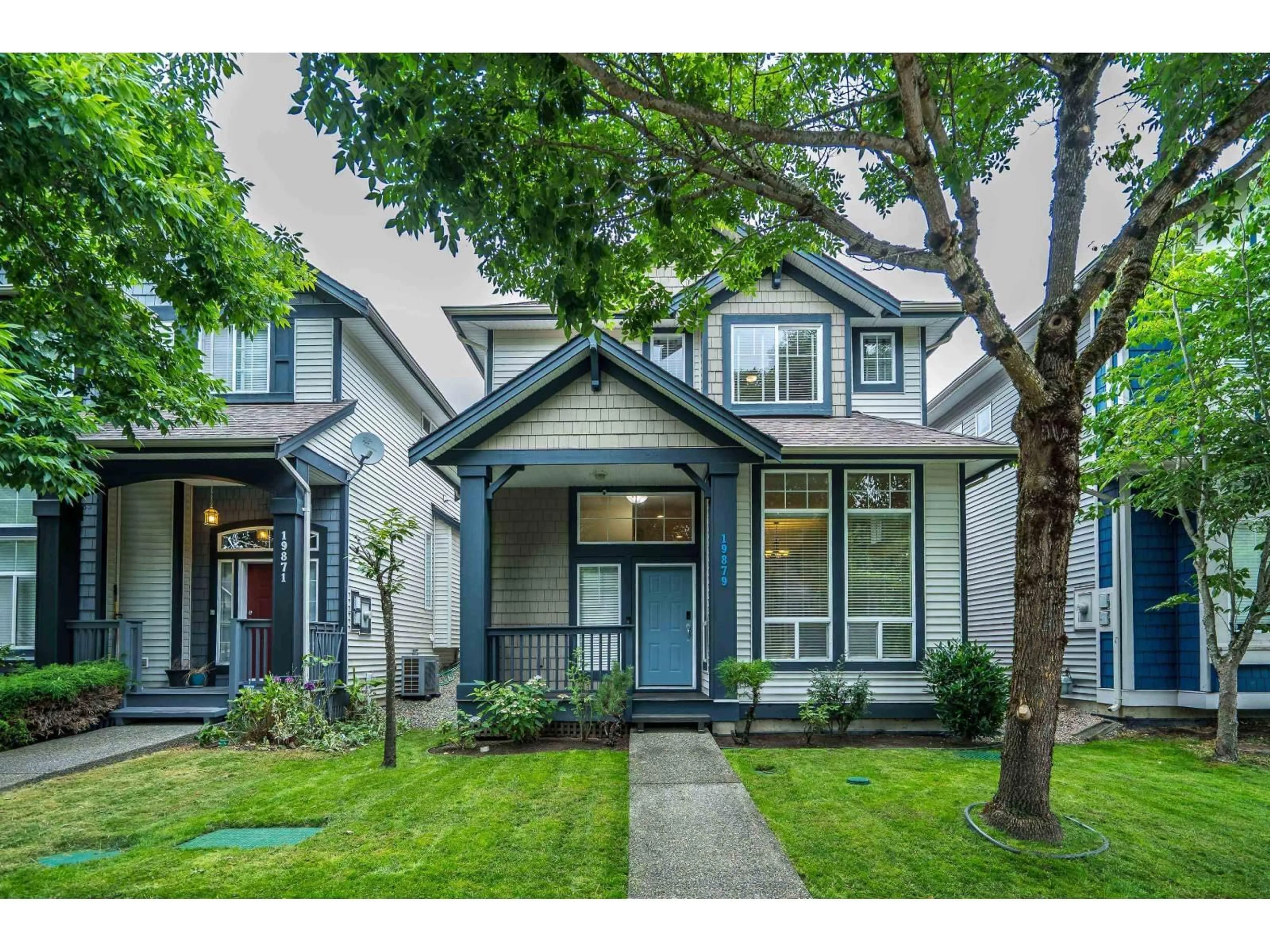 Home with vinyl exterior material, street for 19879 69B, Langley British Columbia V2Y3A8