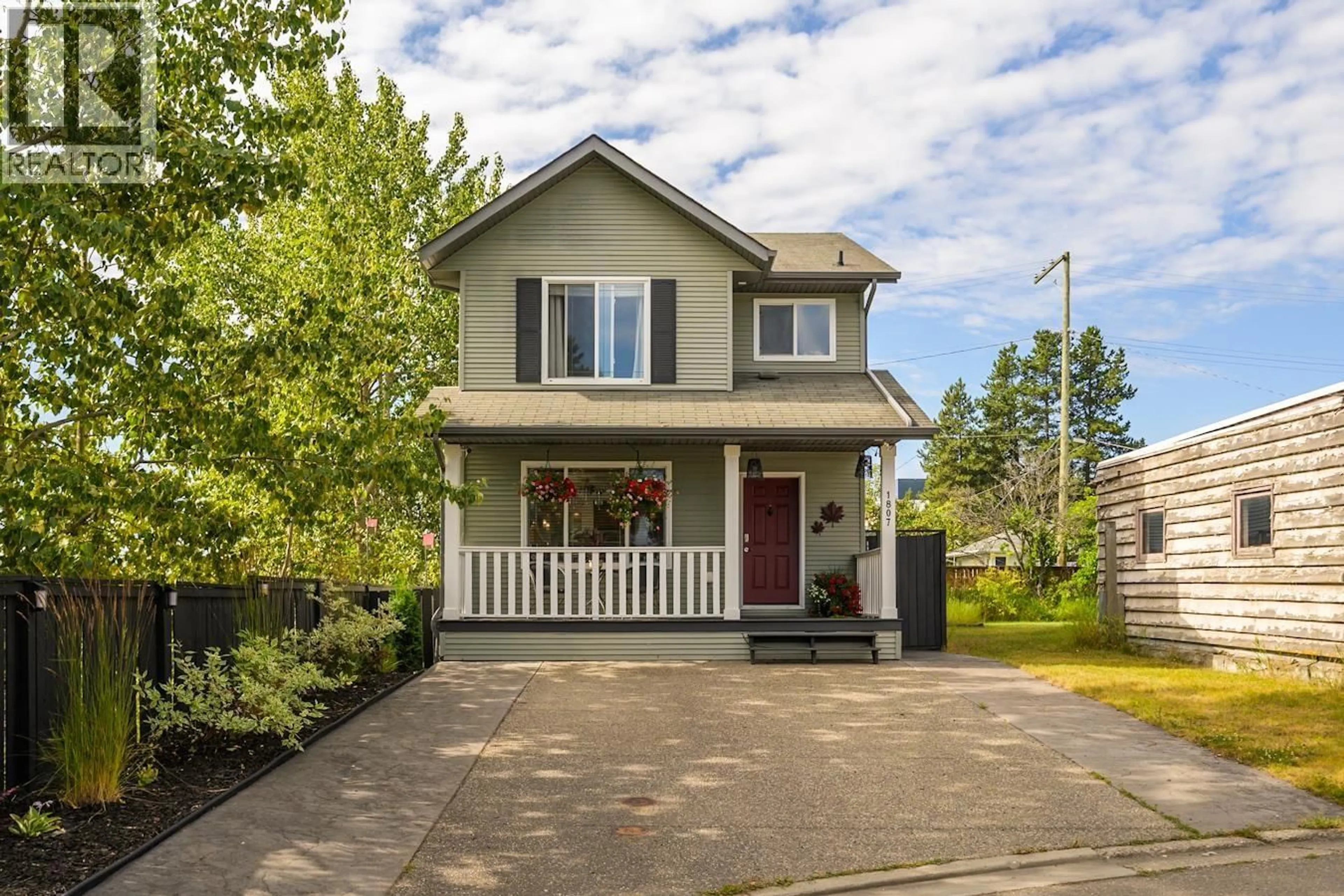 Home with vinyl exterior material, street for 1807 12TH AVENUE, Prince George British Columbia V2M1P8