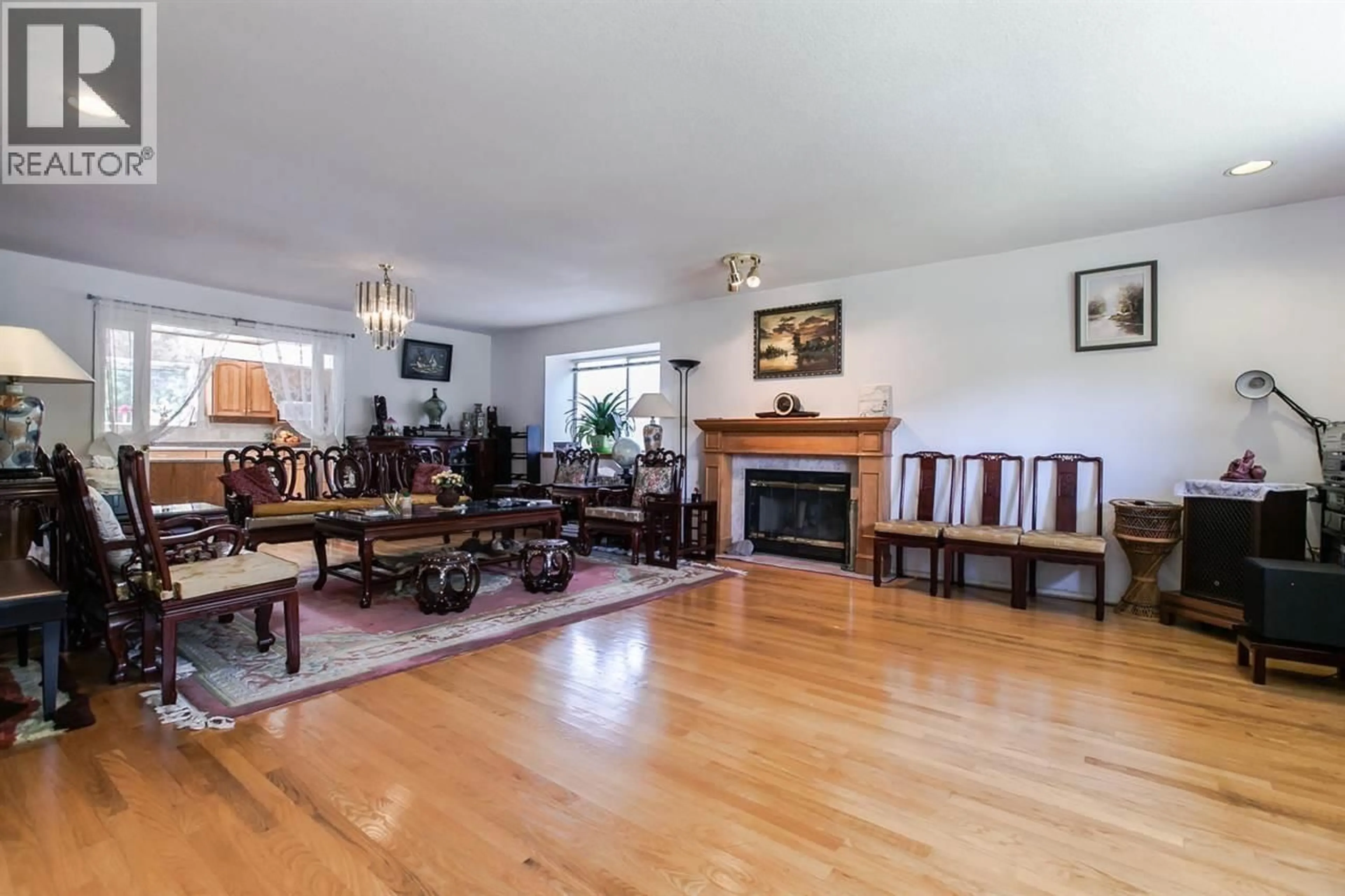 Living room with furniture, wood/laminate floor for 3662 49TH AVENUE, Vancouver British Columbia V6N3T8