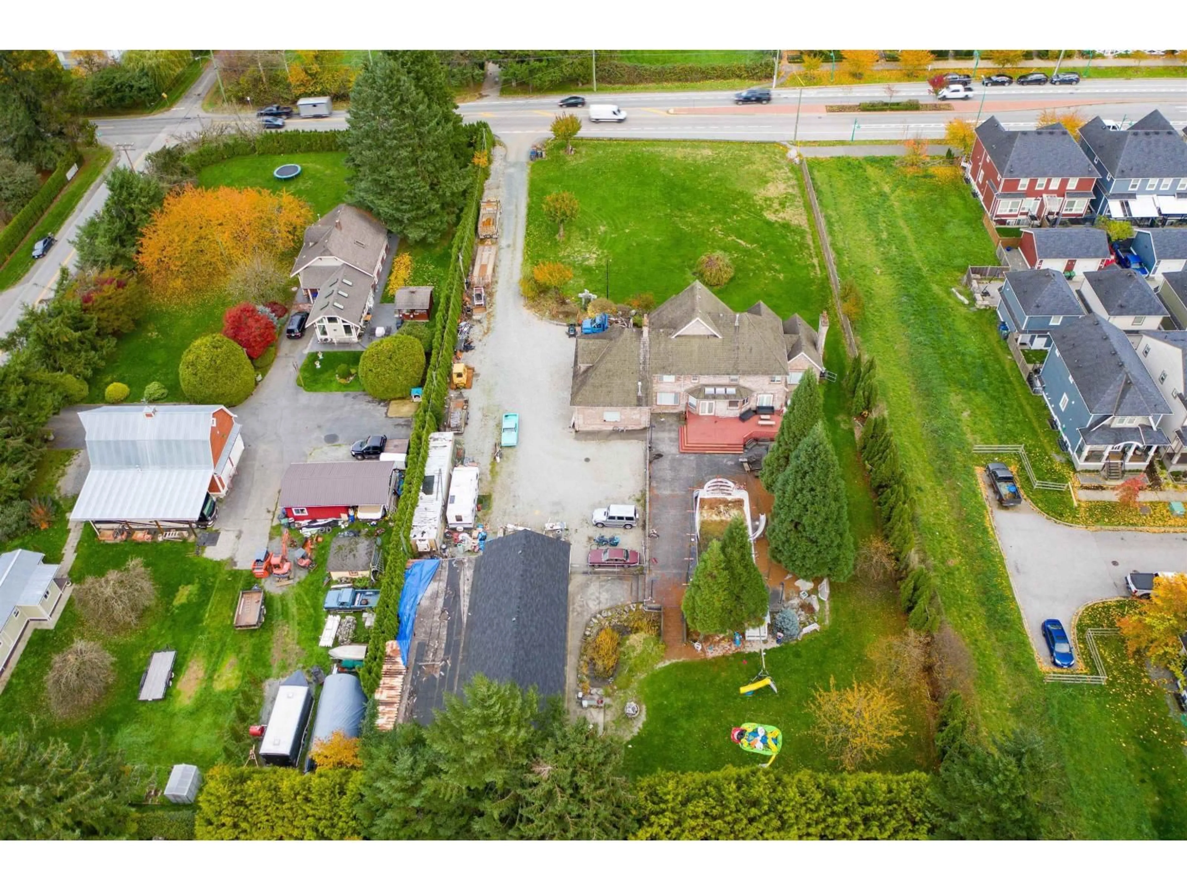 A pic from outside/outdoor area/front of a property/back of a property/a pic from drone, street for 7363 192, Surrey British Columbia V4N5Y4