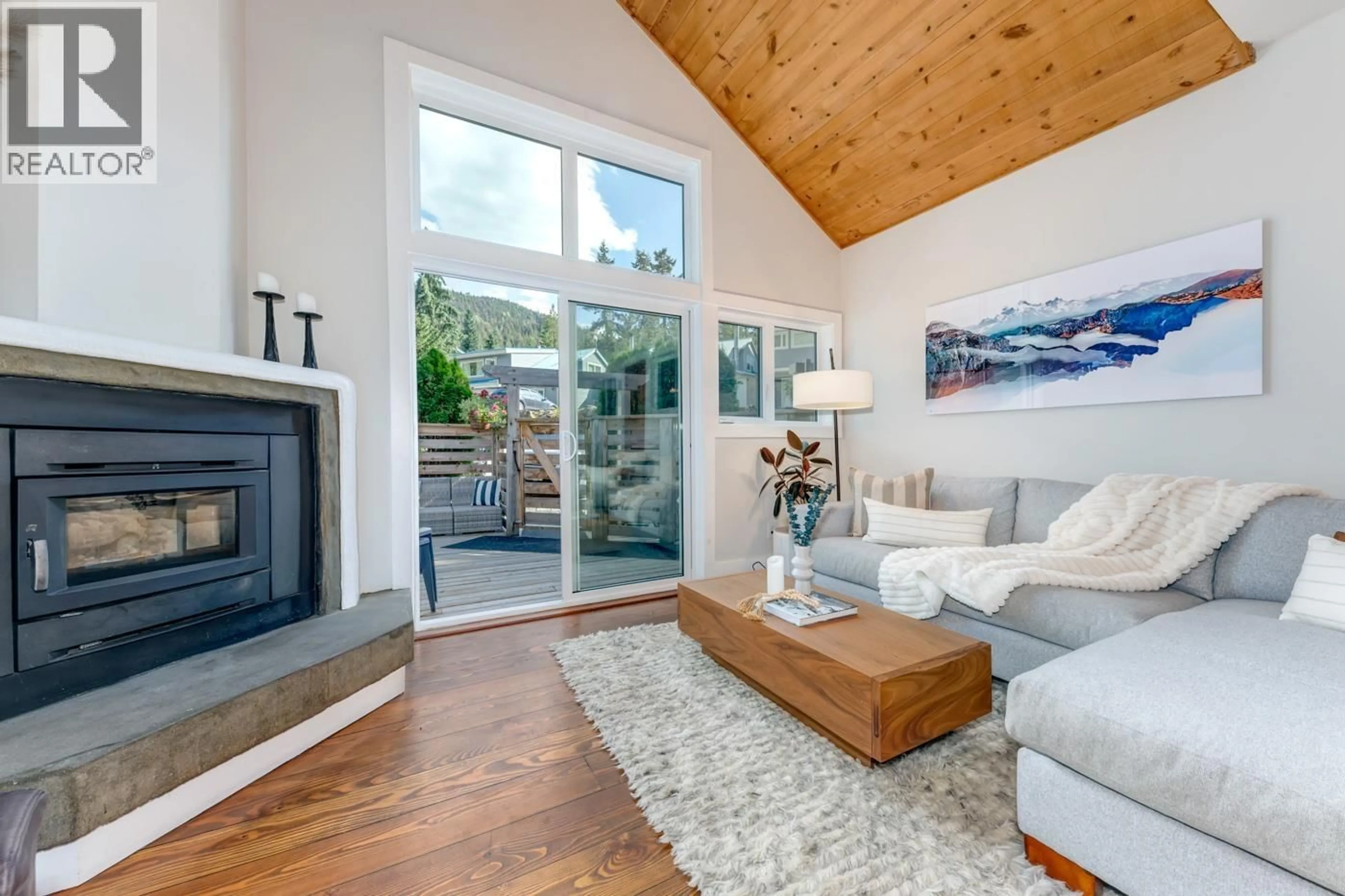 Living room with furniture, wood/laminate floor for 2148 TIMBER RIDGE, Whistler British Columbia V8E0A8