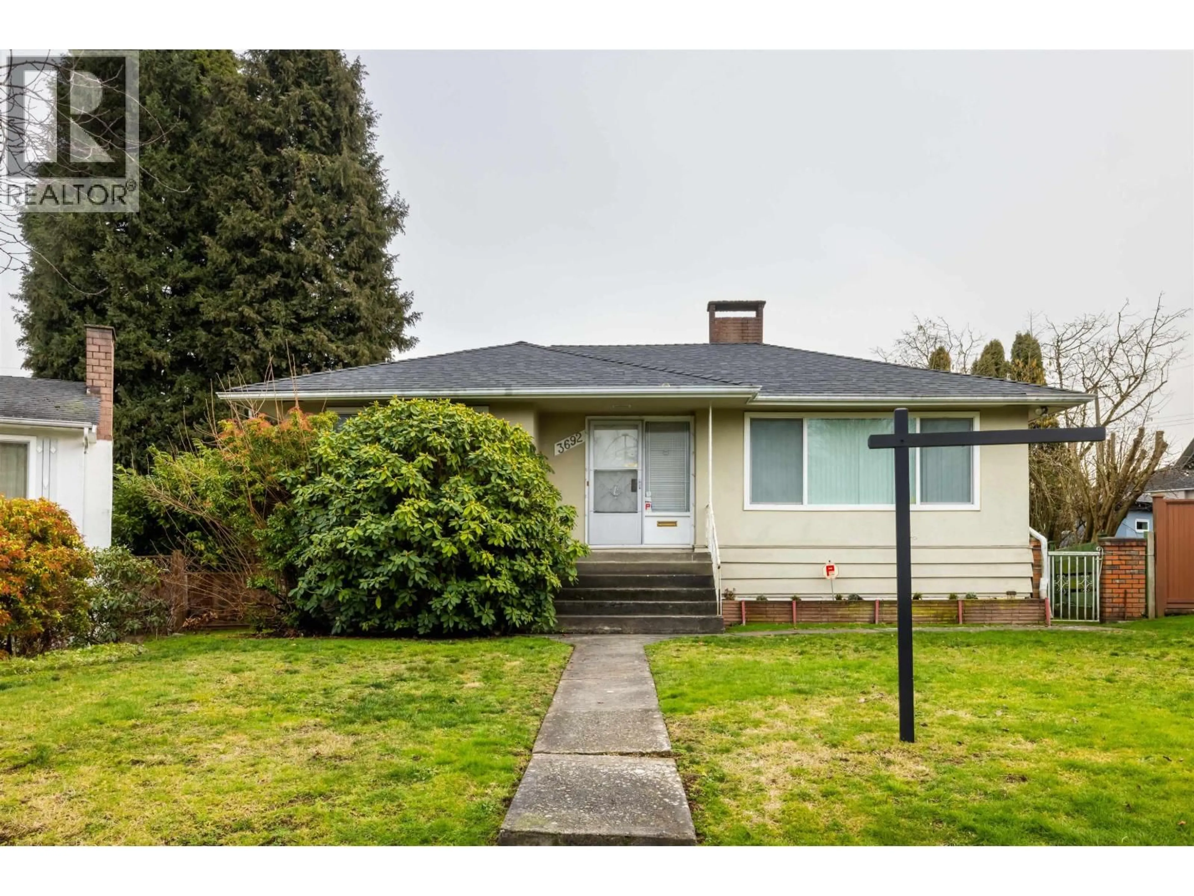 Home with vinyl exterior material, street for 3692 24 AVENUE, Vancouver British Columbia V5R1H1