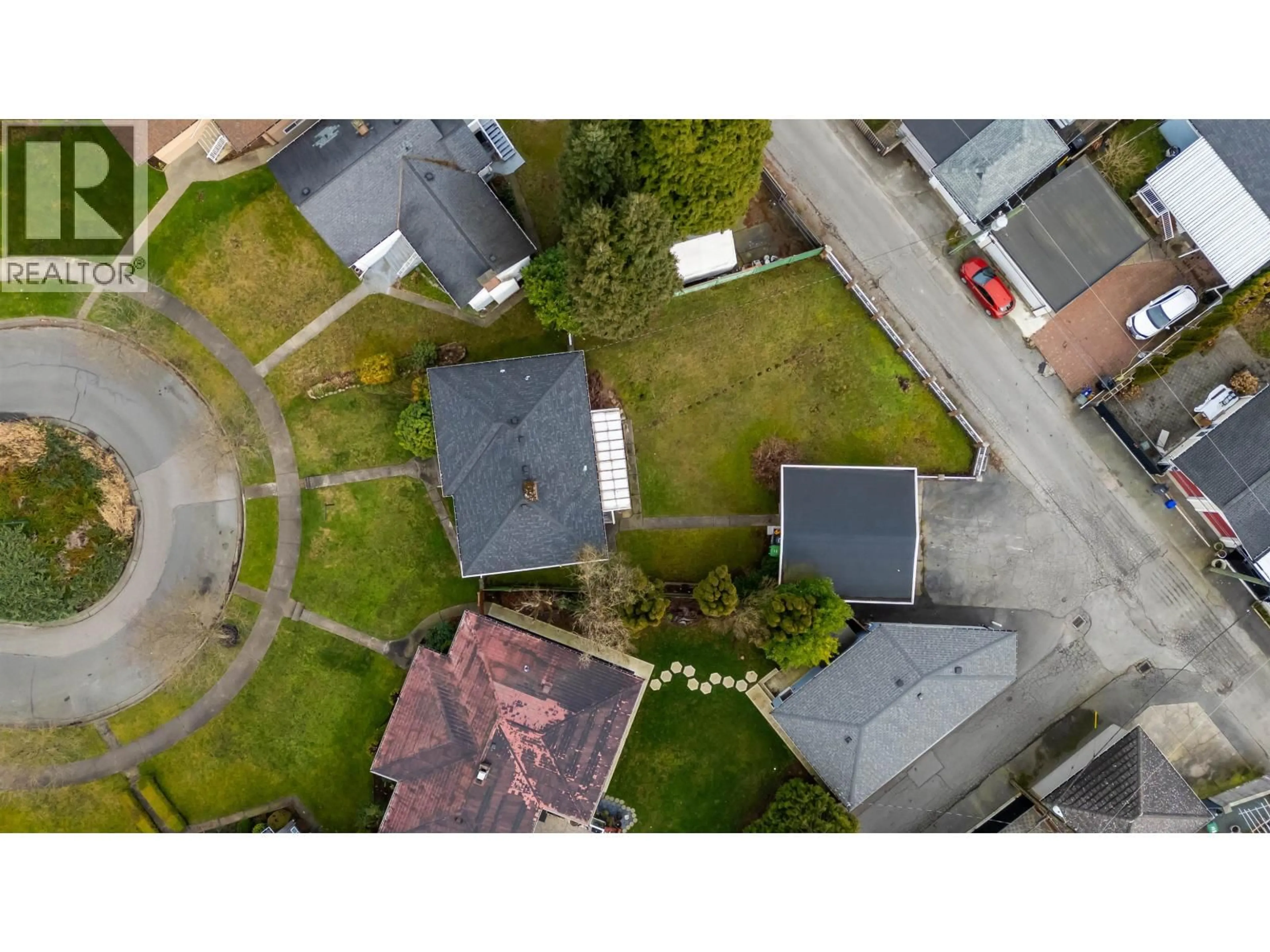 A pic from outside/outdoor area/front of a property/back of a property/a pic from drone, street for 3692 24 AVENUE, Vancouver British Columbia V5R1H1