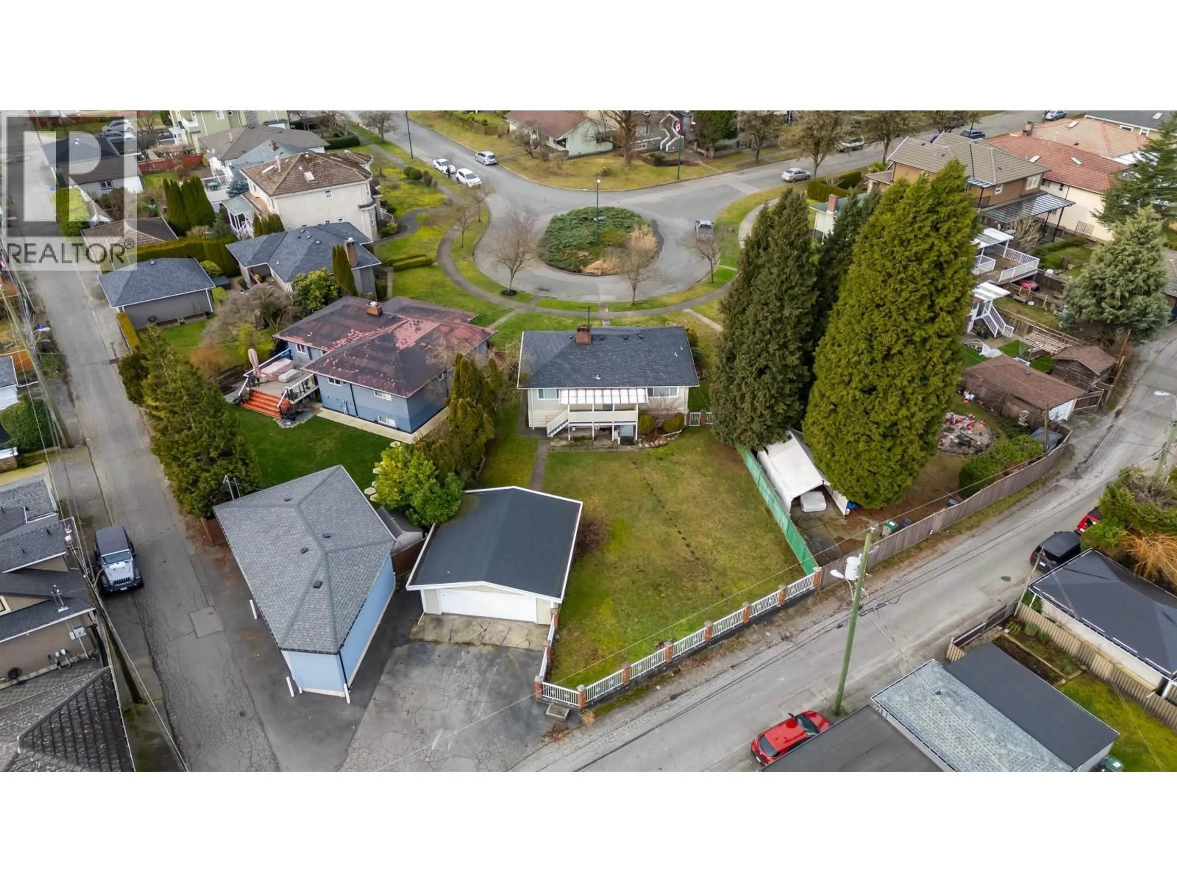 A pic from outside/outdoor area/front of a property/back of a property/a pic from drone, street for 3692 24 AVENUE, Vancouver British Columbia V5R1H1