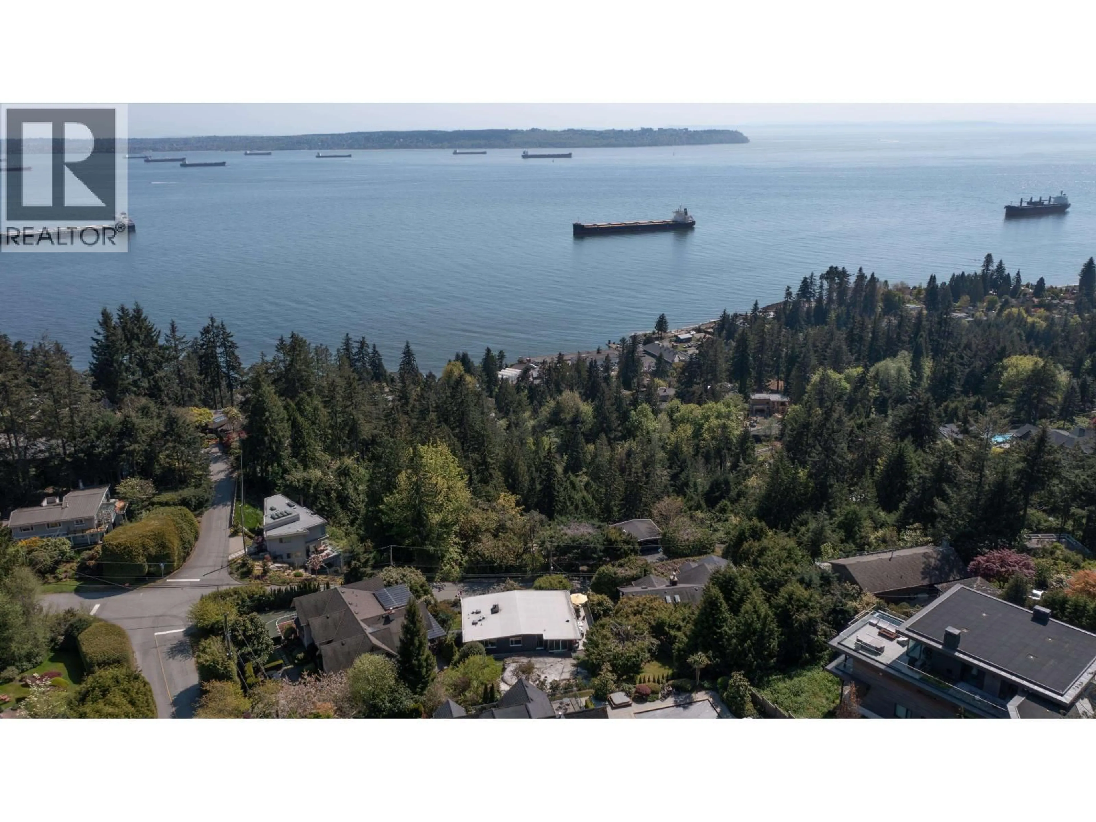 A pic from outside/outdoor area/front of a property/back of a property/a pic from drone, water/lake/river/ocean view for 4045 BAYRIDGE AVENUE, West Vancouver British Columbia V7V3J9