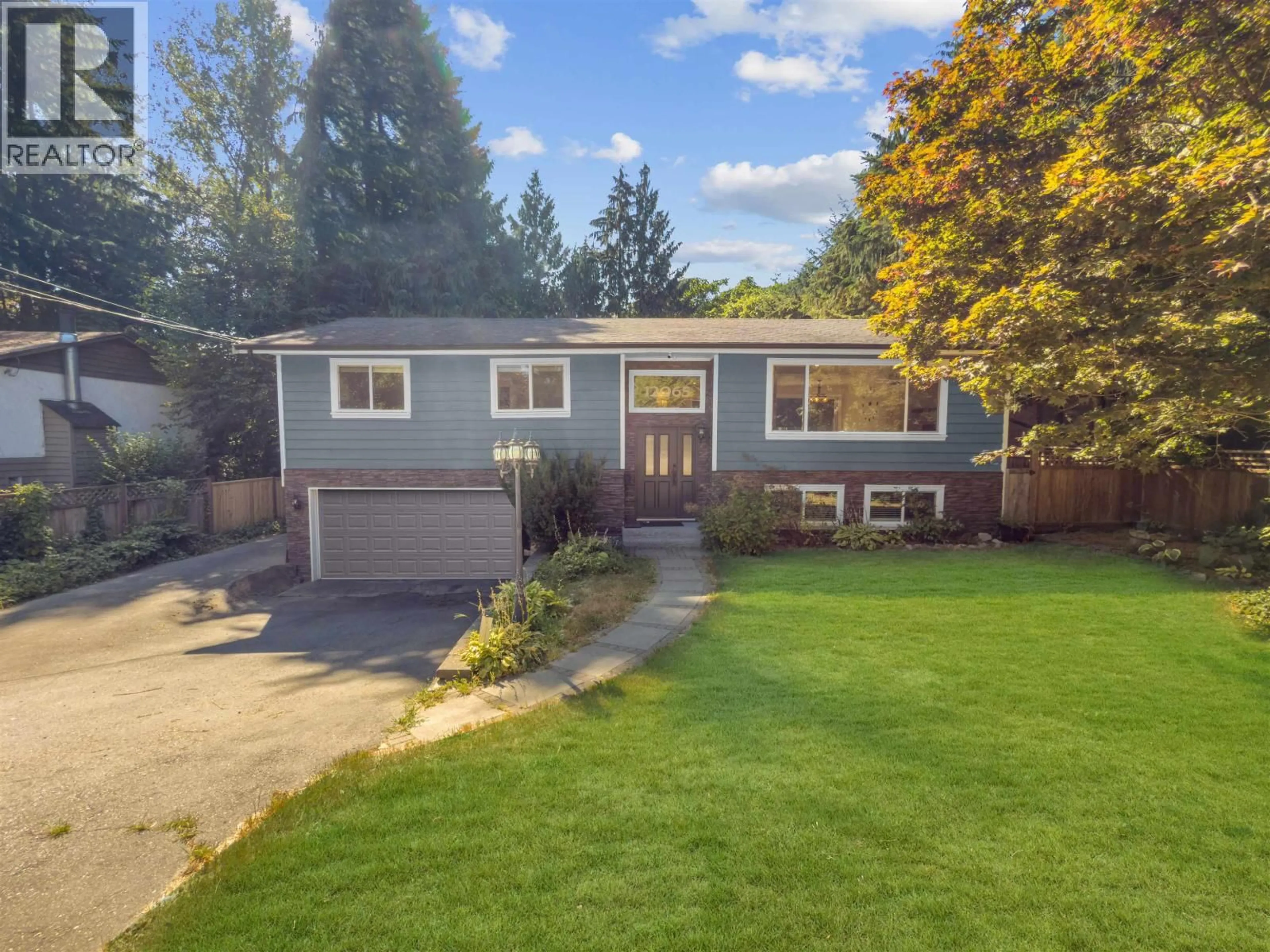Home with vinyl exterior material, street for 12065 208 STREET, Maple Ridge British Columbia V2X4W9