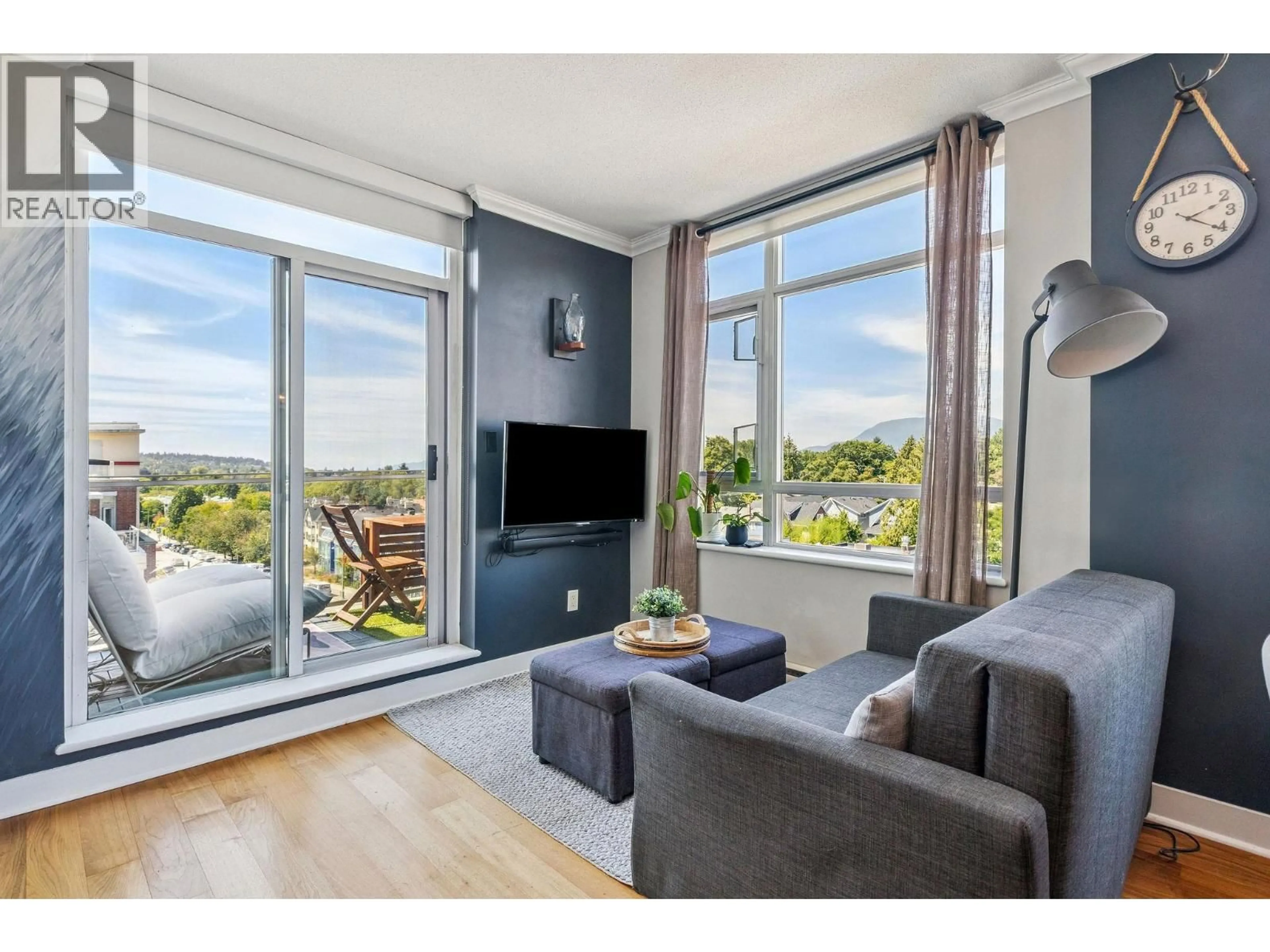 Living room with furniture, wood/laminate floor for 619 - 2268 BROADWAY, Vancouver British Columbia V6K0B2