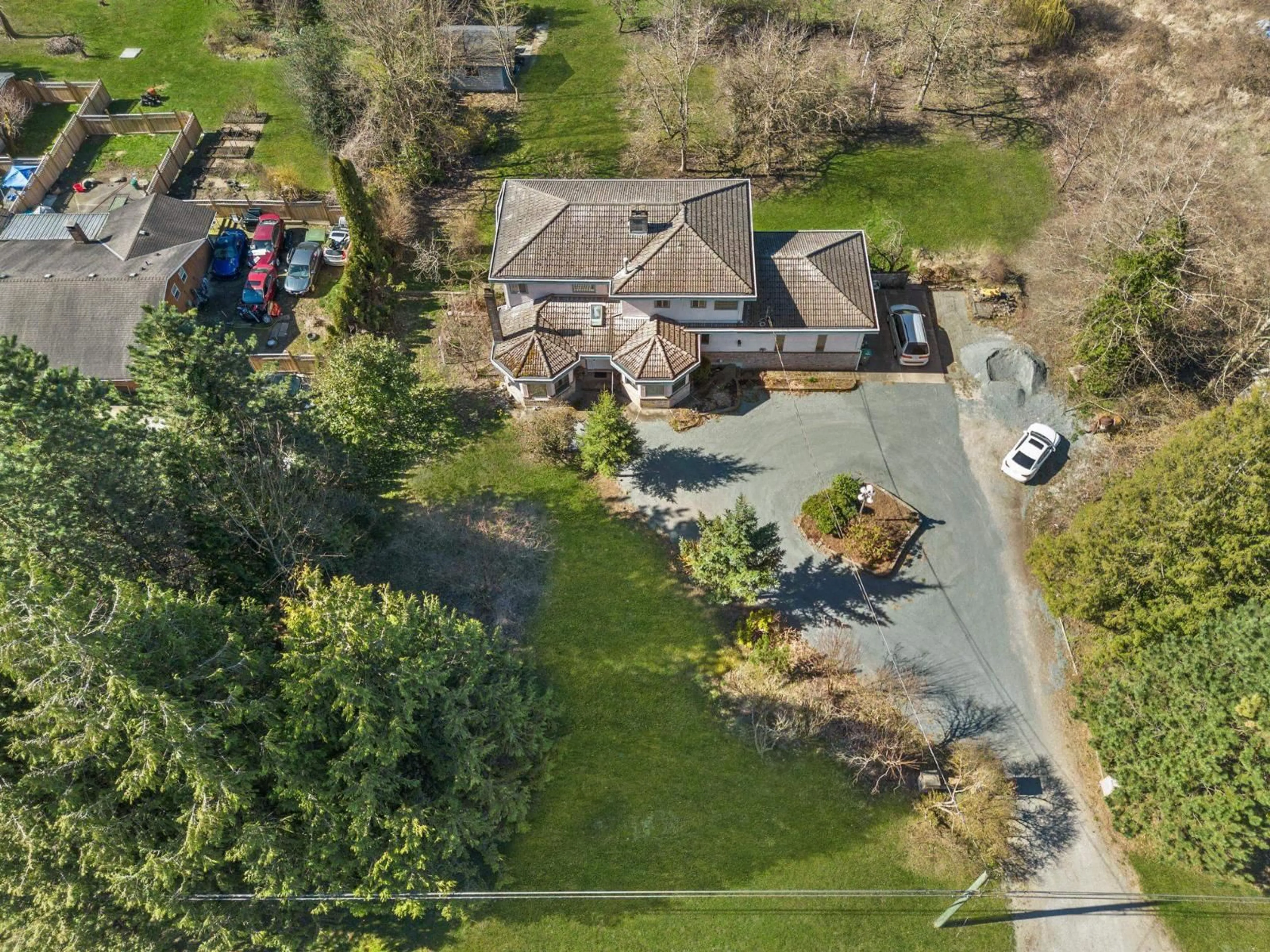 A pic from outside/outdoor area/front of a property/back of a property/a pic from drone, street for 7931 192, Surrey British Columbia V4N5S9