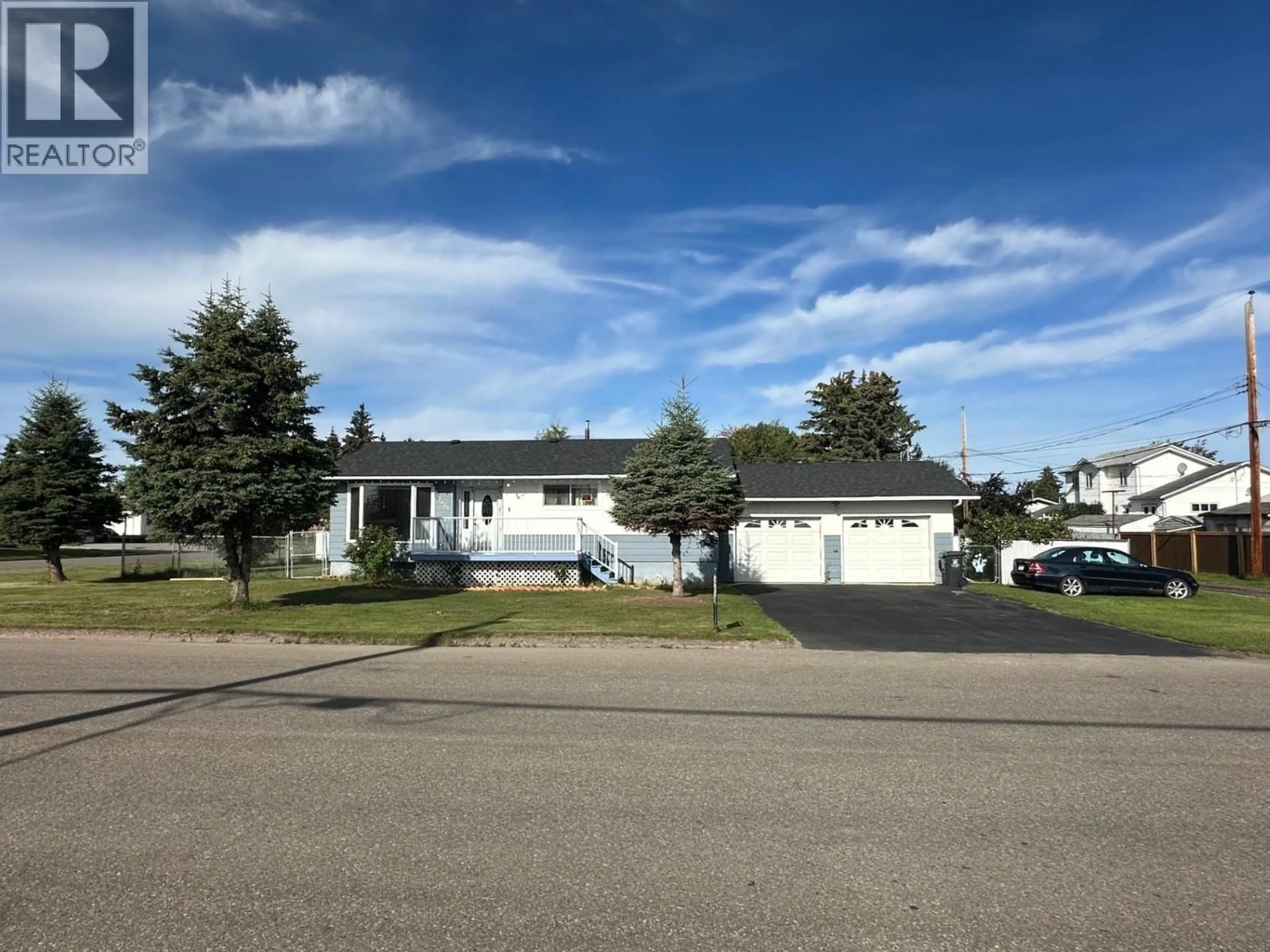 Home with vinyl exterior material, street for 10404 92 STREET, Fort St. John British Columbia V1J3H8