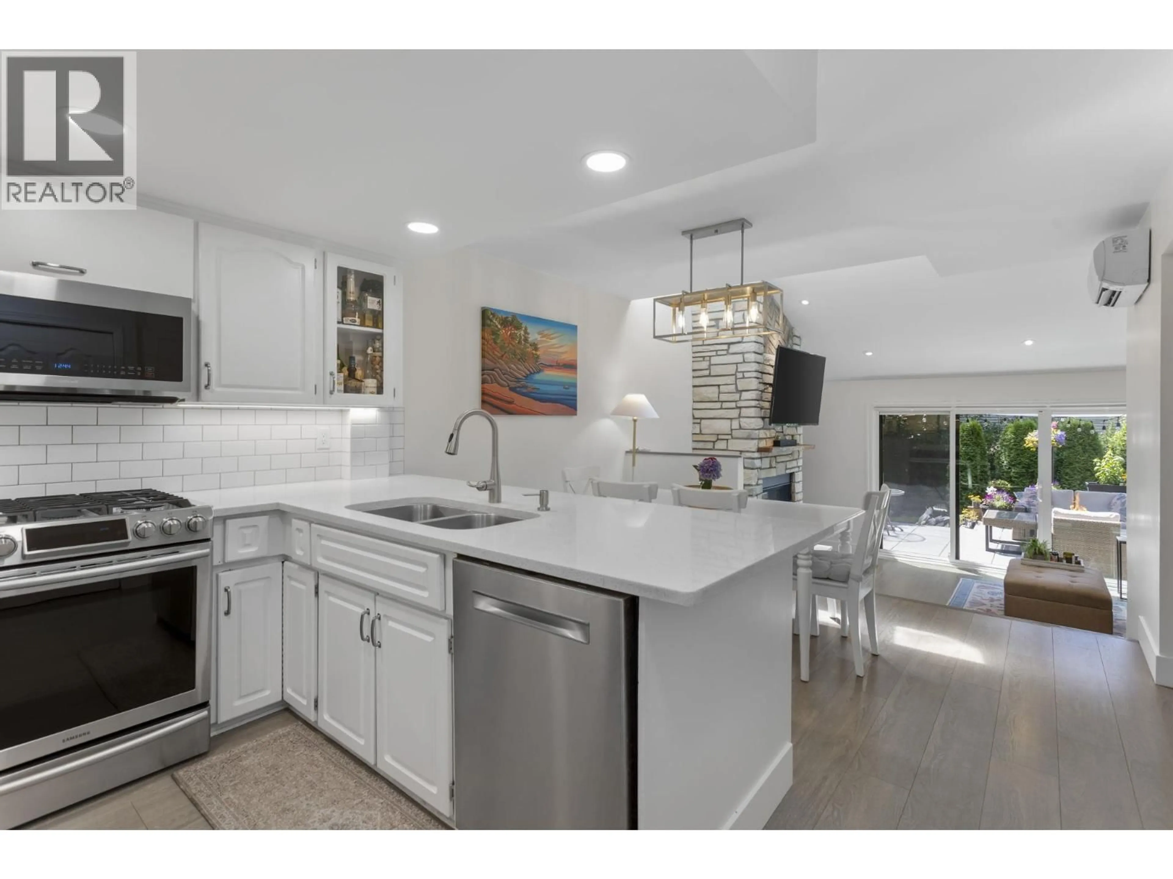 Open concept kitchen, ceramic/tile floor for 8572 WILDERNESS COURT, Burnaby British Columbia V5A4B2