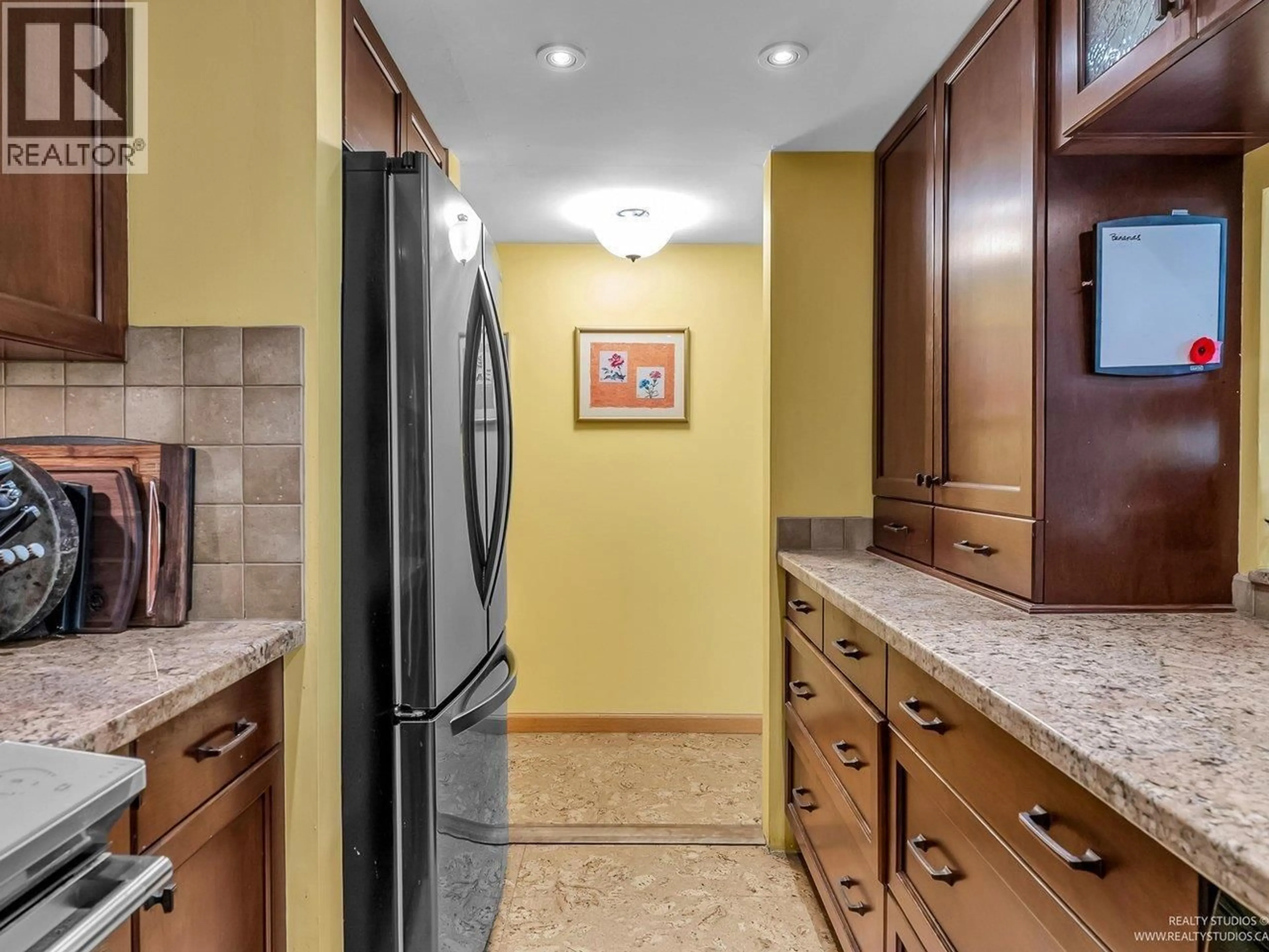 Standard kitchen, ceramic/tile floor for 2217 OAK STREET, Vancouver British Columbia V6H3W6