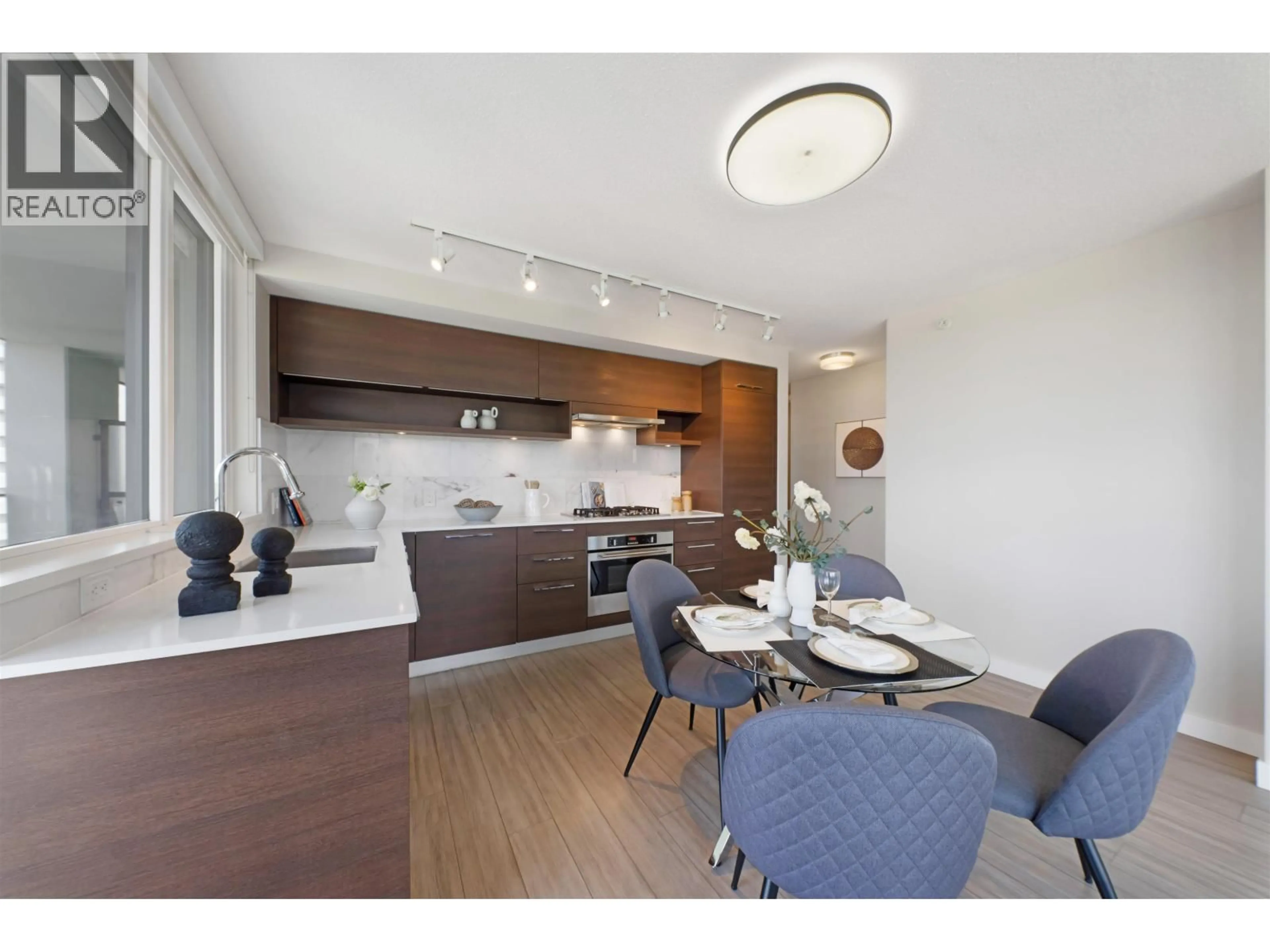 Open concept kitchen, wood/laminate floor for 2607 - 570 EMERSON AVENUE, Coquitlam British Columbia V3J0G3