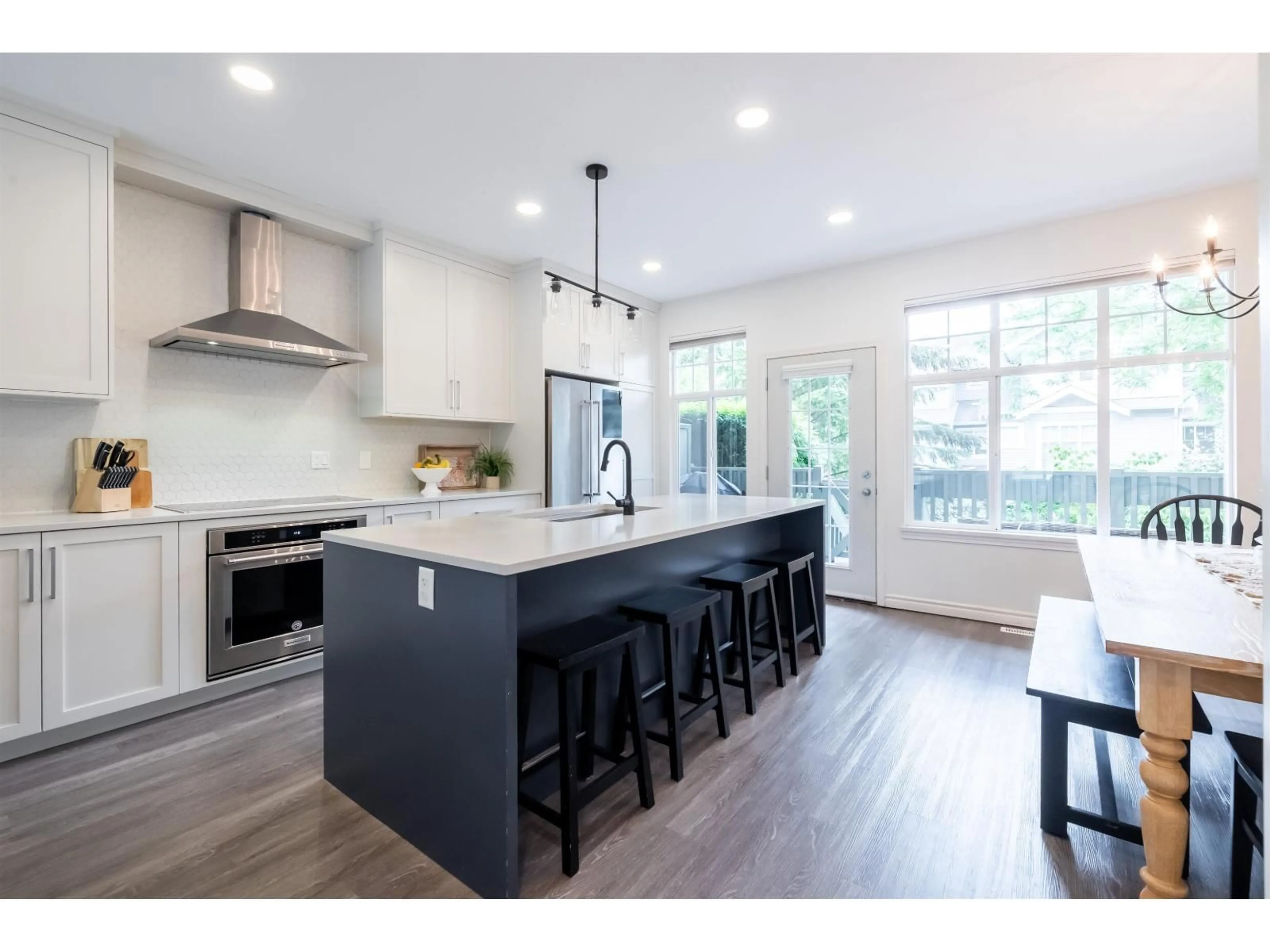 Open concept kitchen, wood/laminate floor for 30 - 6050 166, Surrey British Columbia V3X0X2