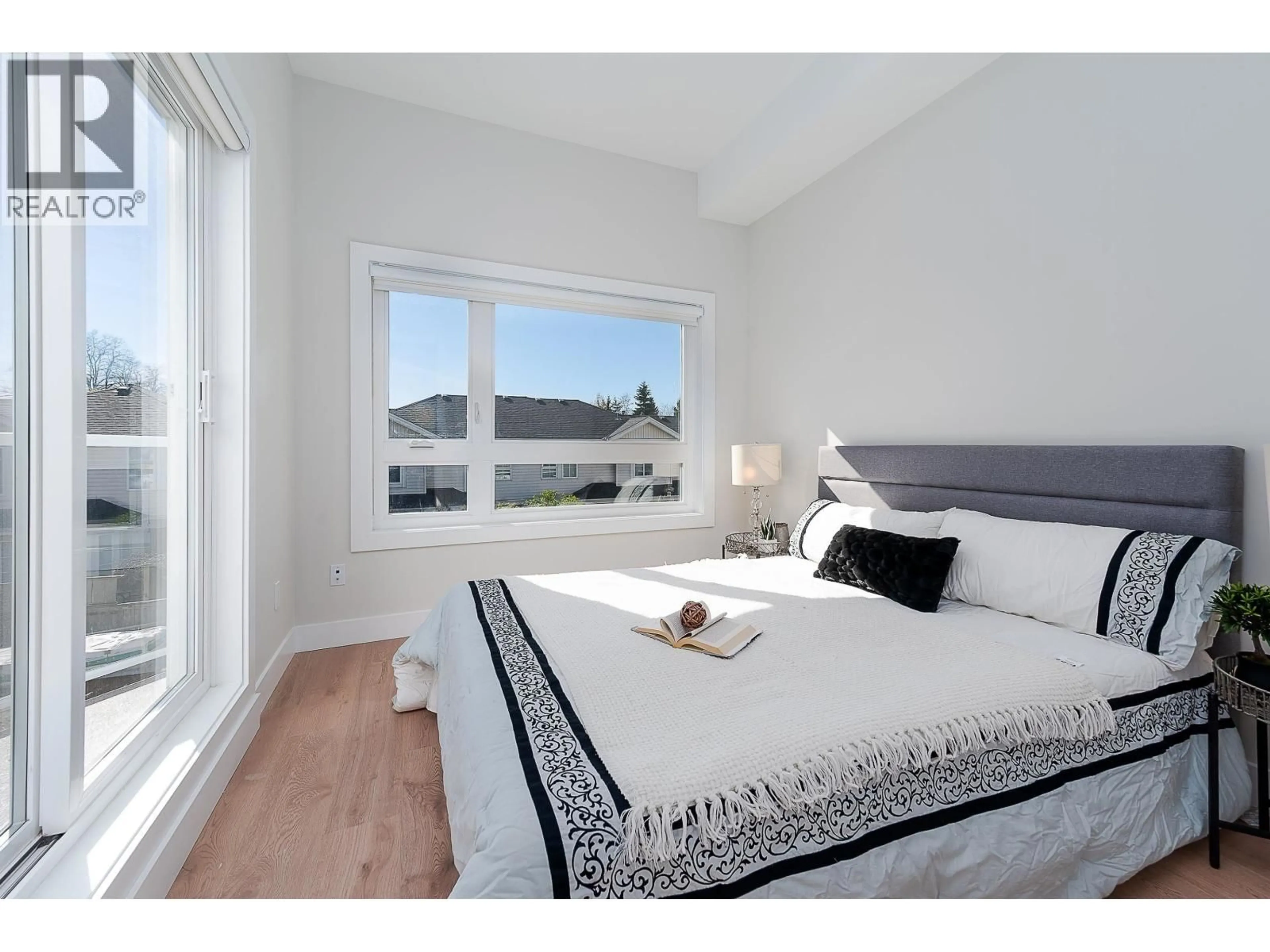 Bedroom with bed, wood/laminate floor for 4 - 3033 SHELL ROAD, Richmond British Columbia V6X0B8
