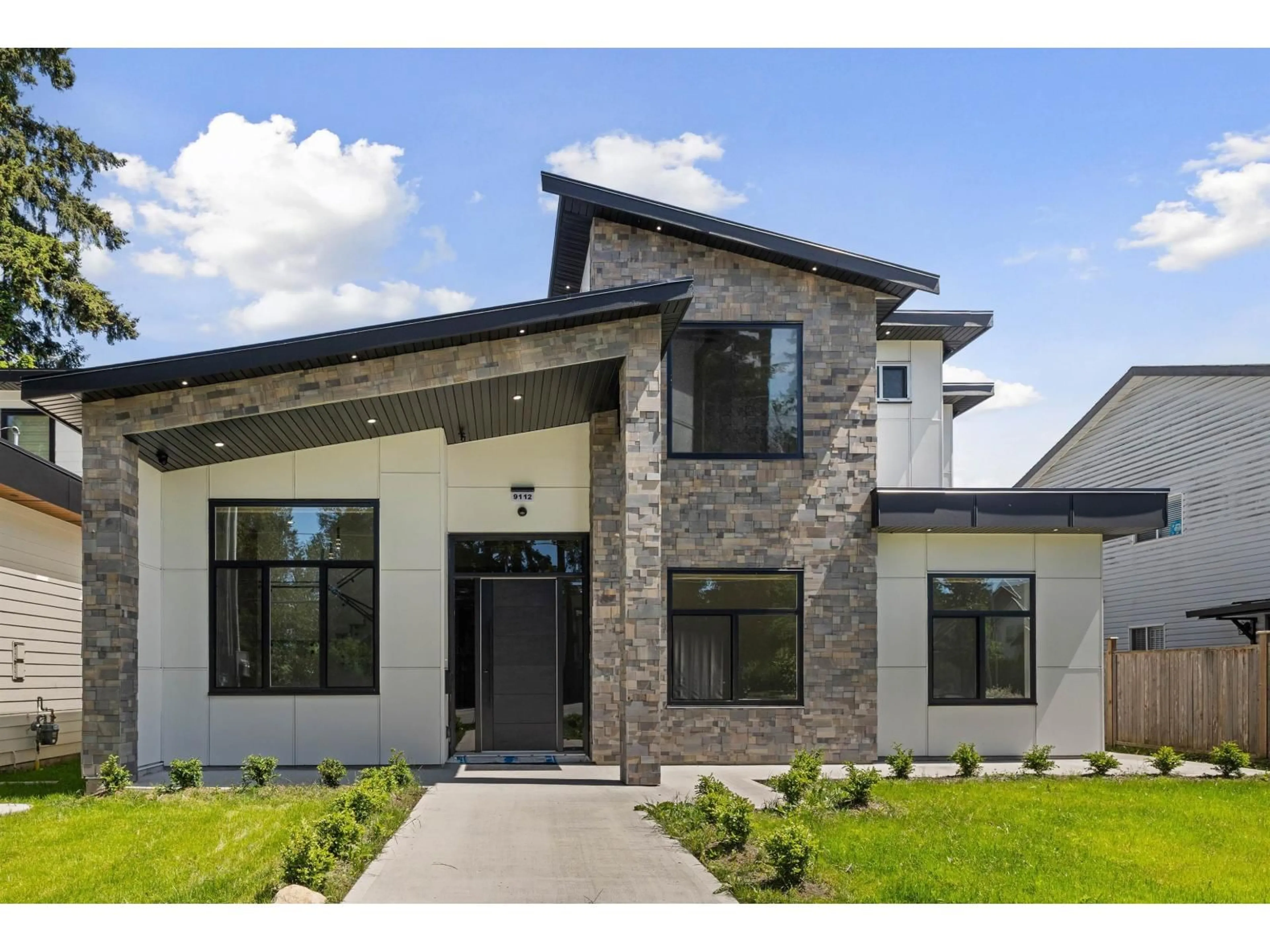 Home with brick exterior material, unknown for 9112 156, Surrey British Columbia V3R5Y8