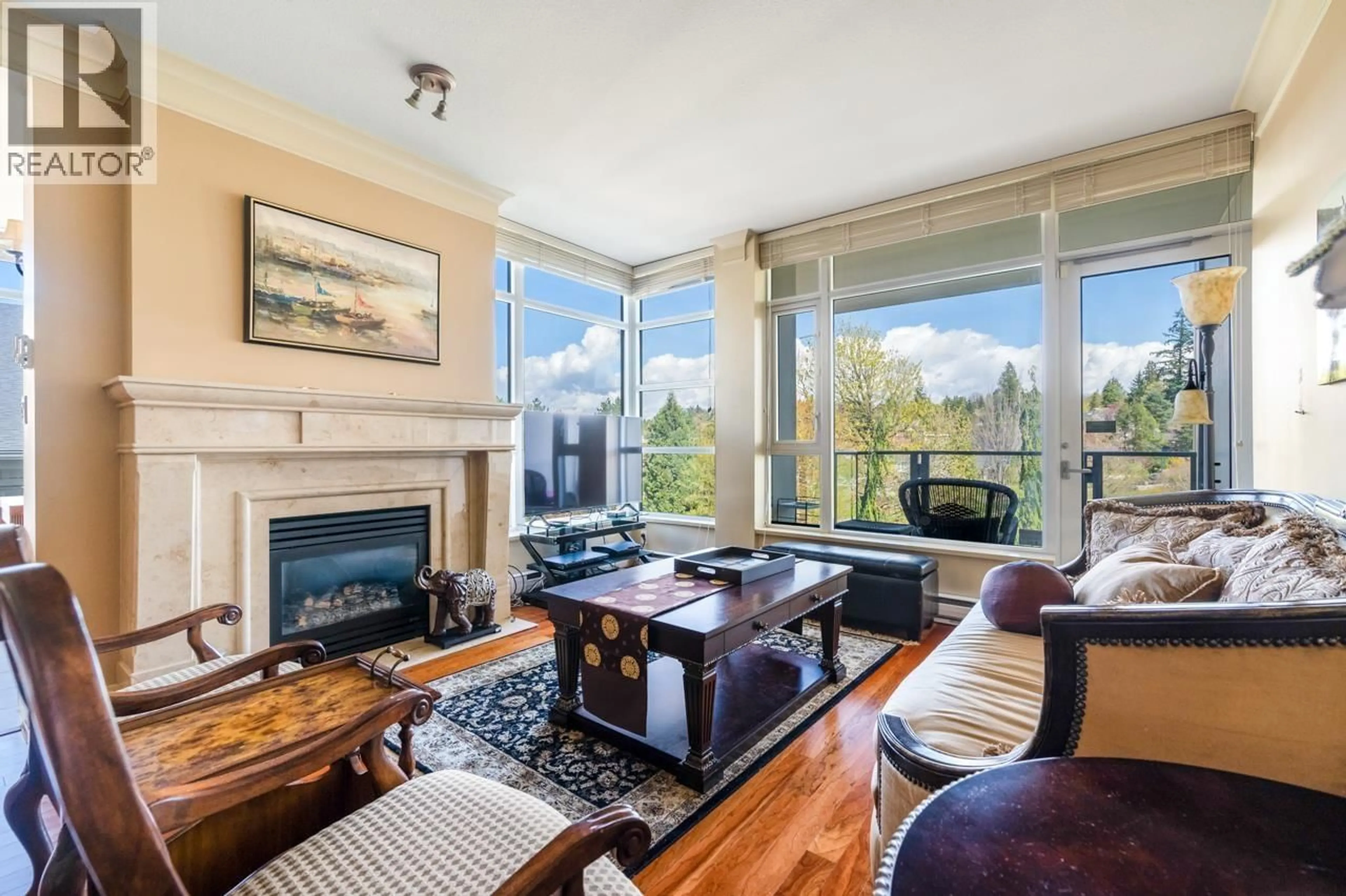 Living room with furniture, wood/laminate floor for 403 - 4685 VALLEY DRIVE, Vancouver British Columbia V6J5M2