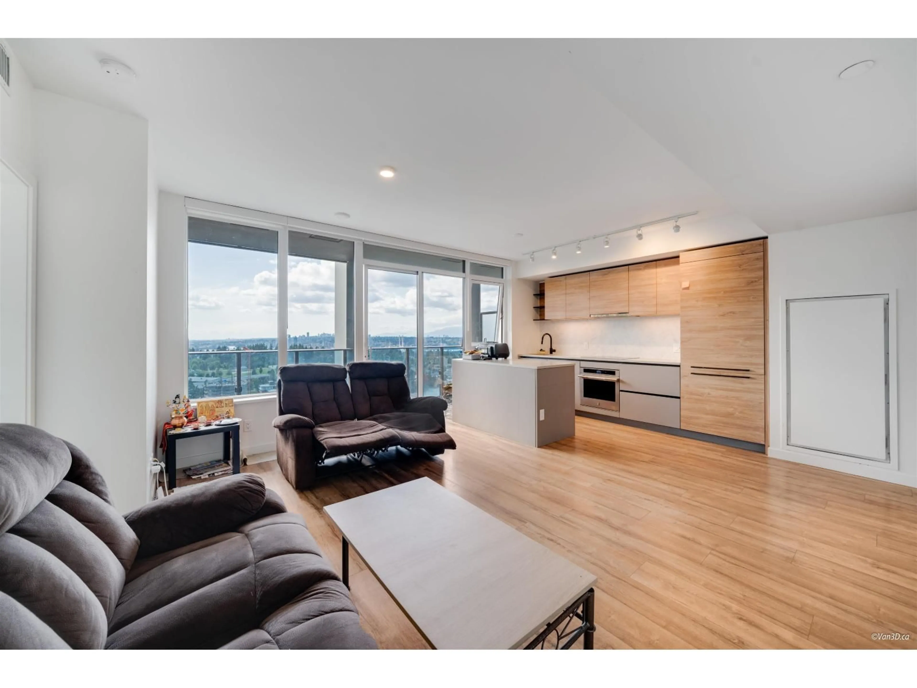 Living room with furniture, wood/laminate floor for 2710 - 10448 UNIVERSITY, Surrey British Columbia V3T0S7