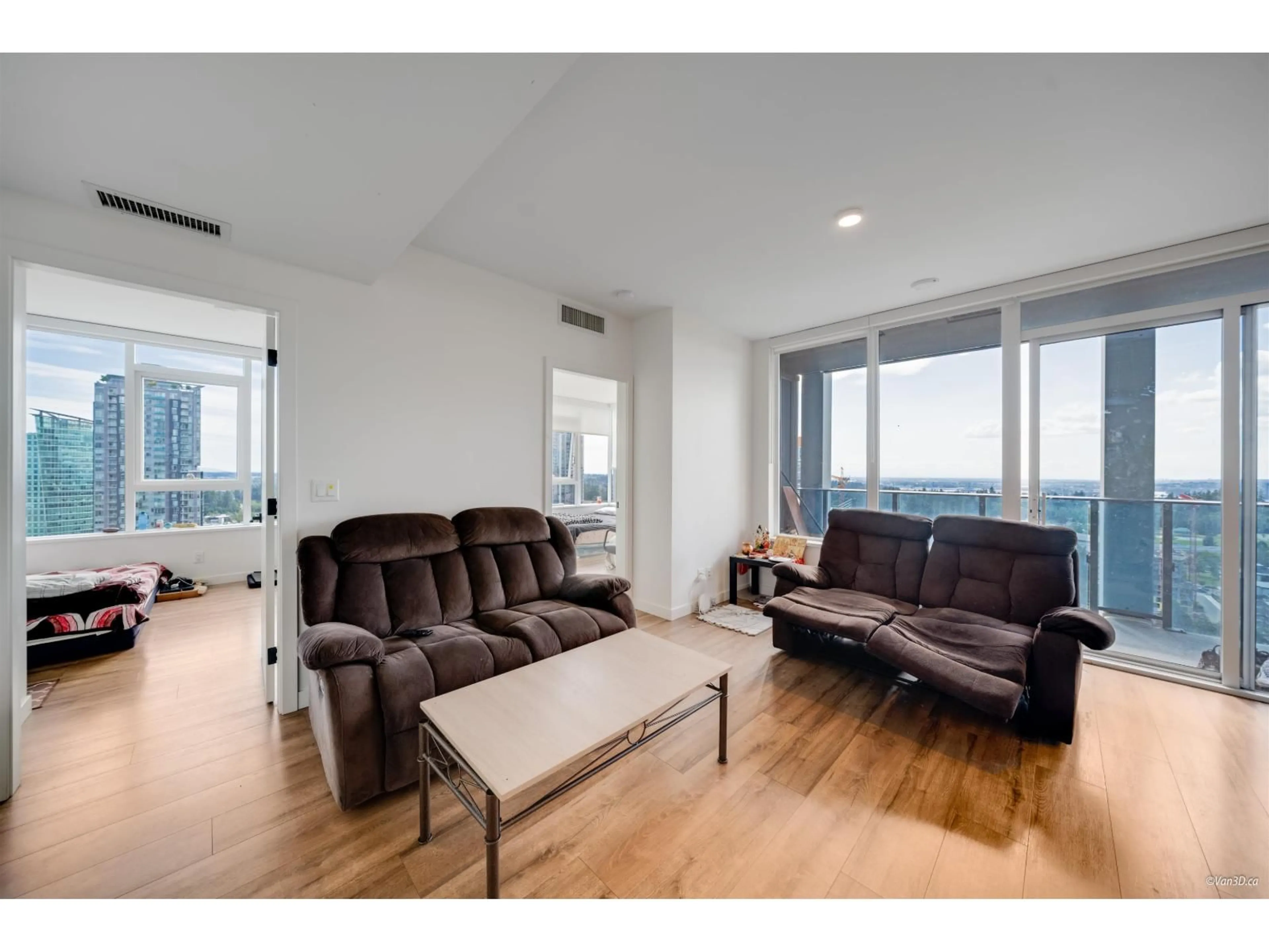Living room with furniture, wood/laminate floor for 2710 - 10448 UNIVERSITY, Surrey British Columbia V3T0S7
