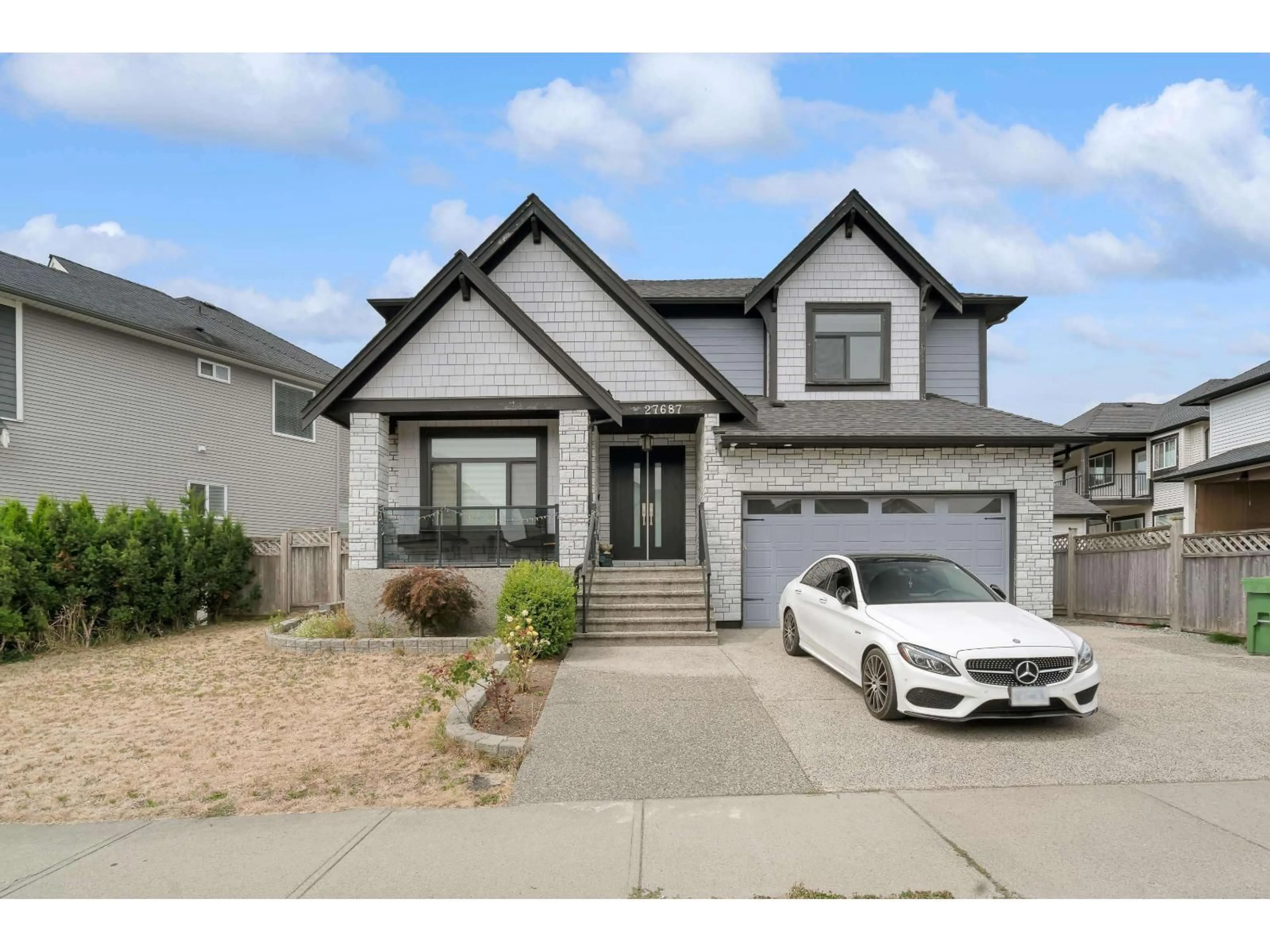 Home with vinyl exterior material, street for 27687 RAILCAR, Abbotsford British Columbia V4X0B8