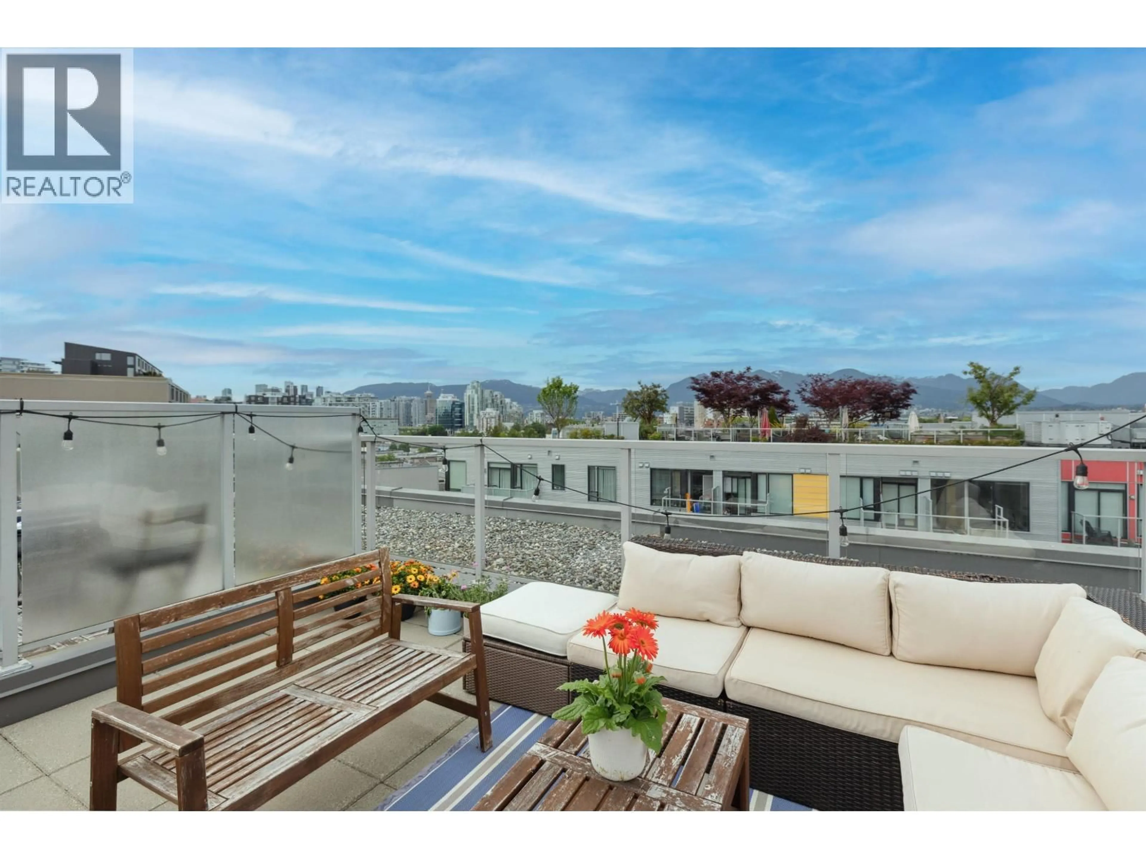 Patio, city buildings view from balcony for 605 - 417 GREAT NORTHERN WAY, Vancouver British Columbia V5T0G7