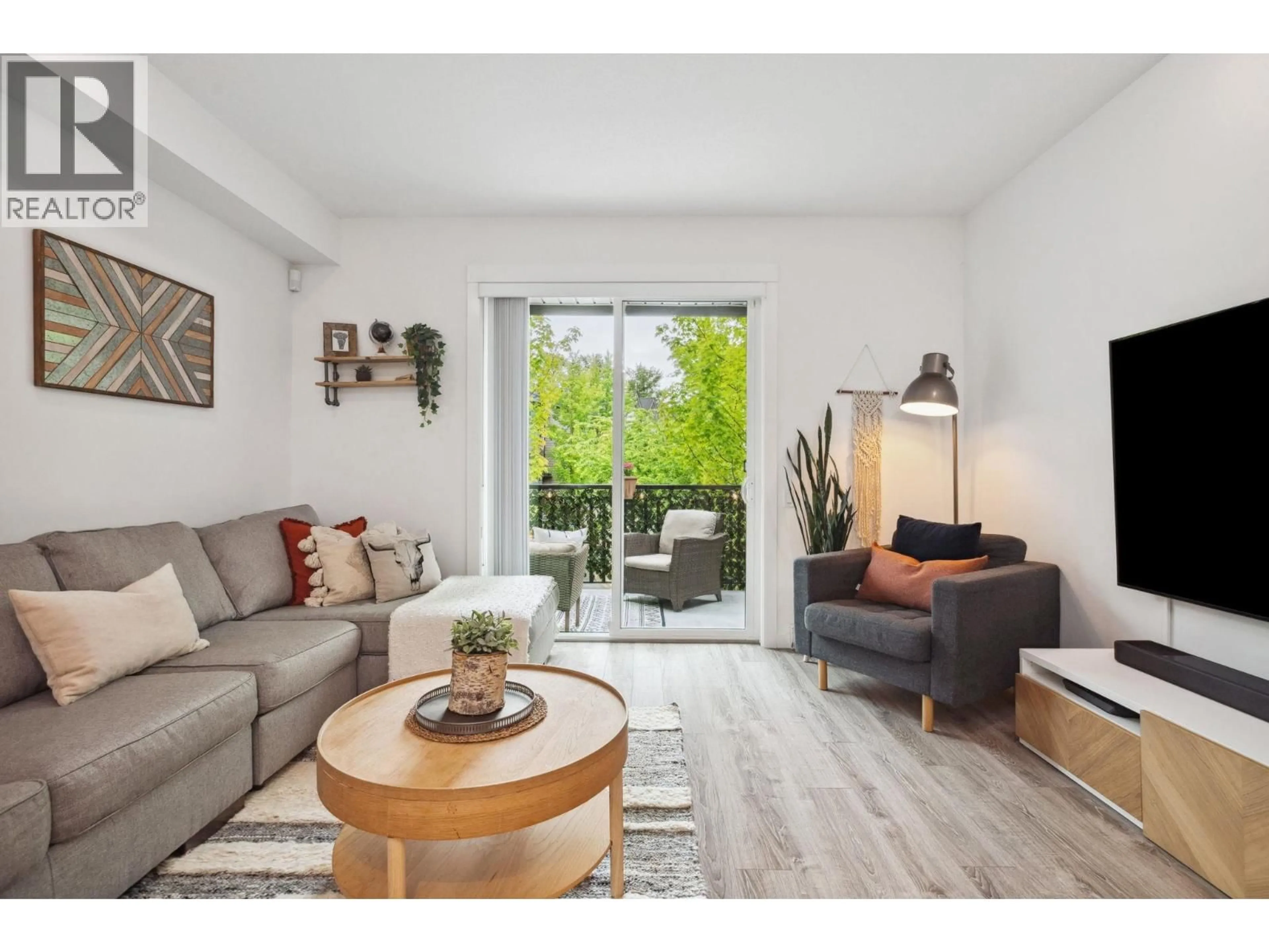 Living room with furniture, wood/laminate floor for 58 - 2380 RANGER LANE, Port Coquitlam British Columbia V3B0M4