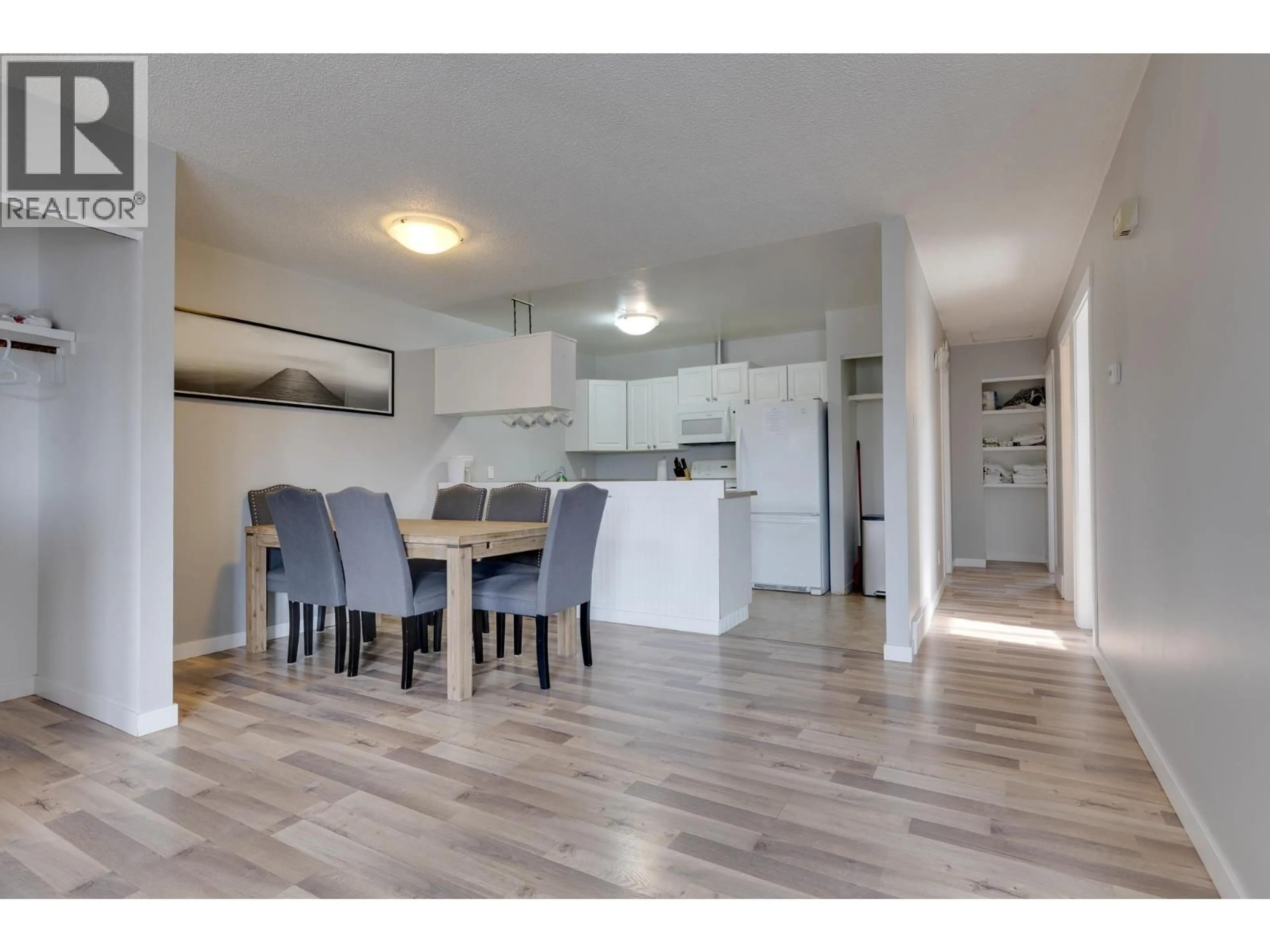 Open concept kitchen, wood/laminate floor for 4258 QUENTIN AVENUE, Prince George British Columbia V2M5L3