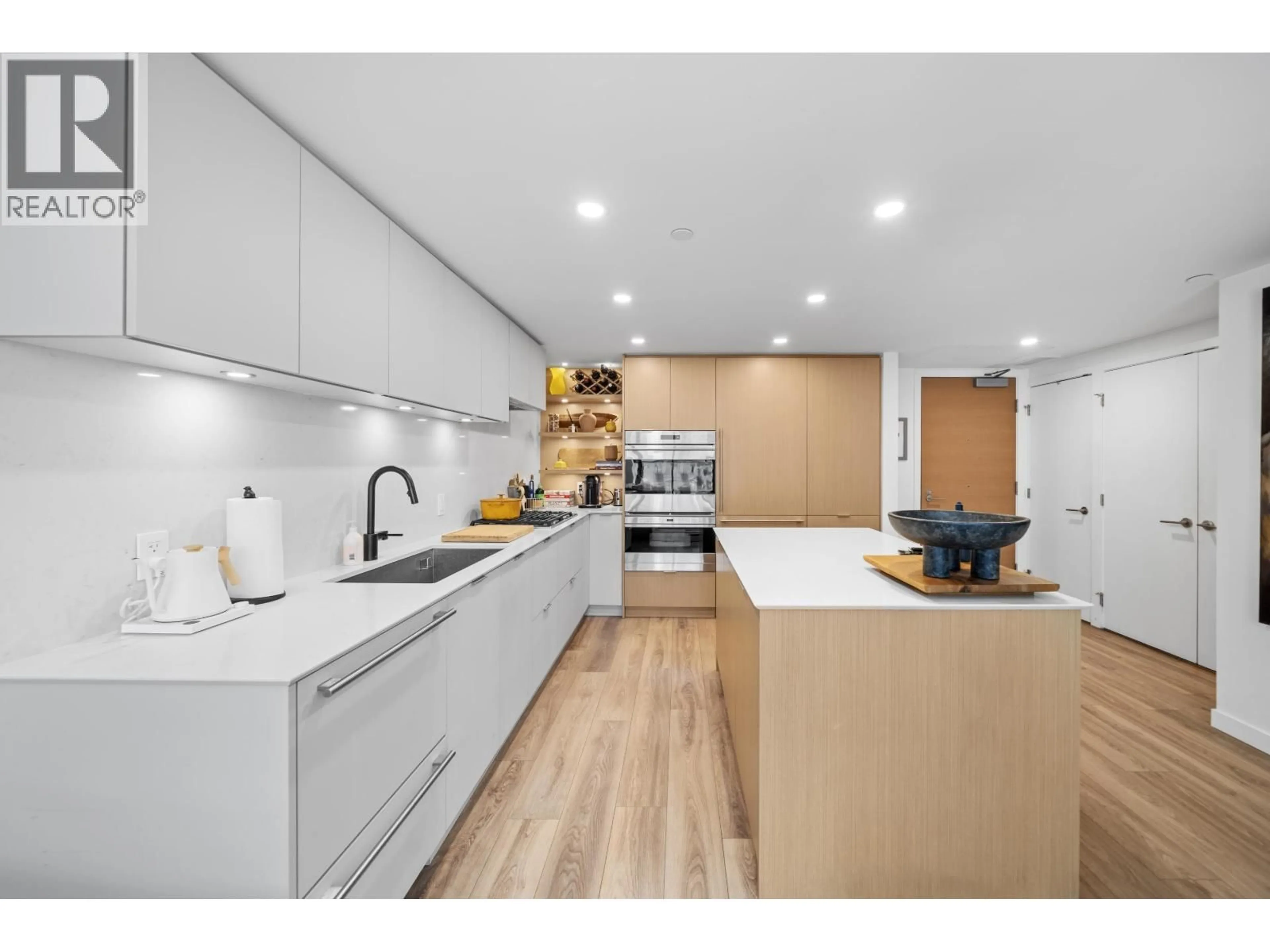 Open concept kitchen, unknown for 302 - 210 5TH AVENUE, Vancouver British Columbia V5T0K1