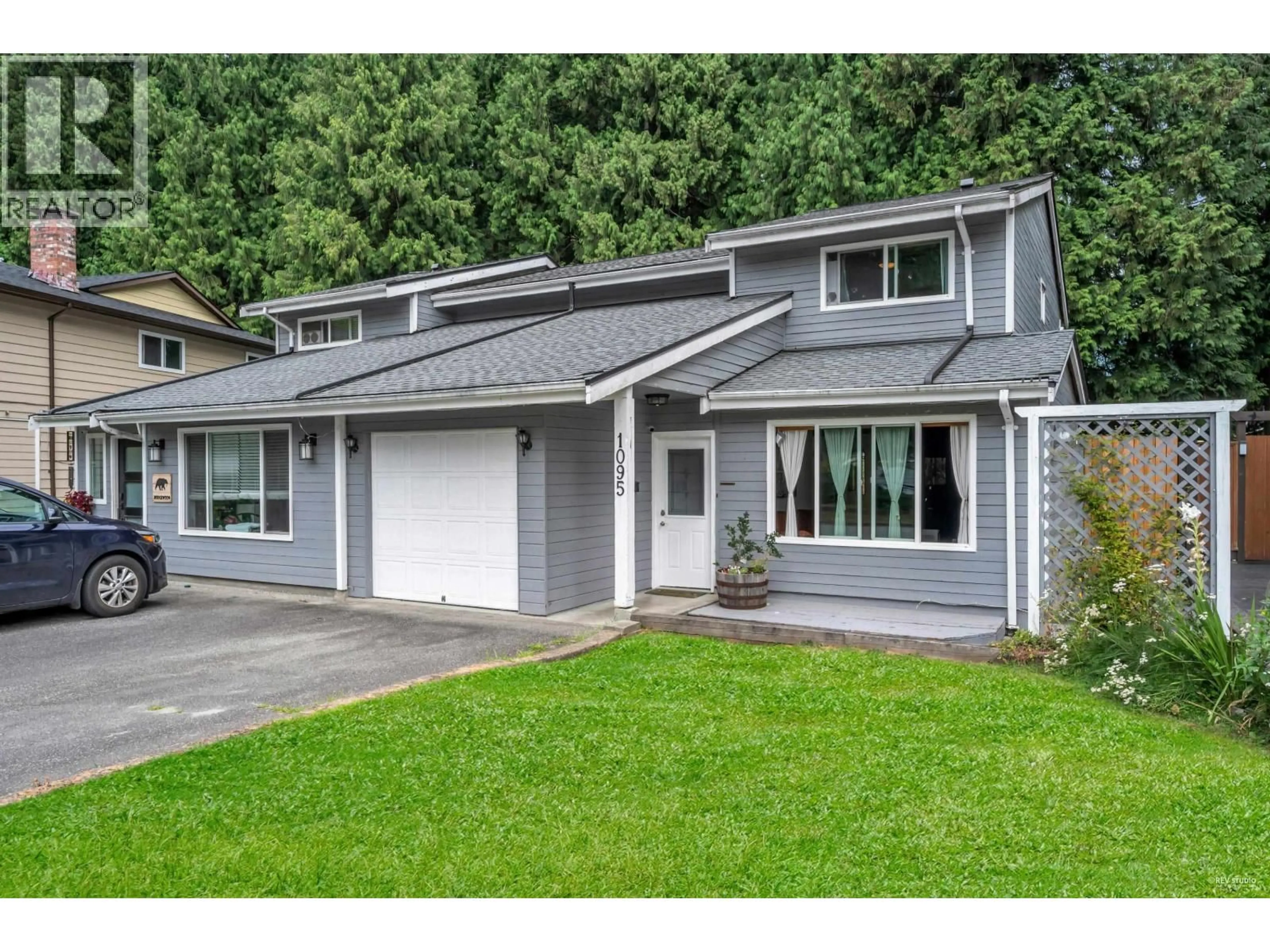 Home with vinyl exterior material, street for 1095 SPRUCE AVENUE, Port Coquitlam British Columbia V3B5T9