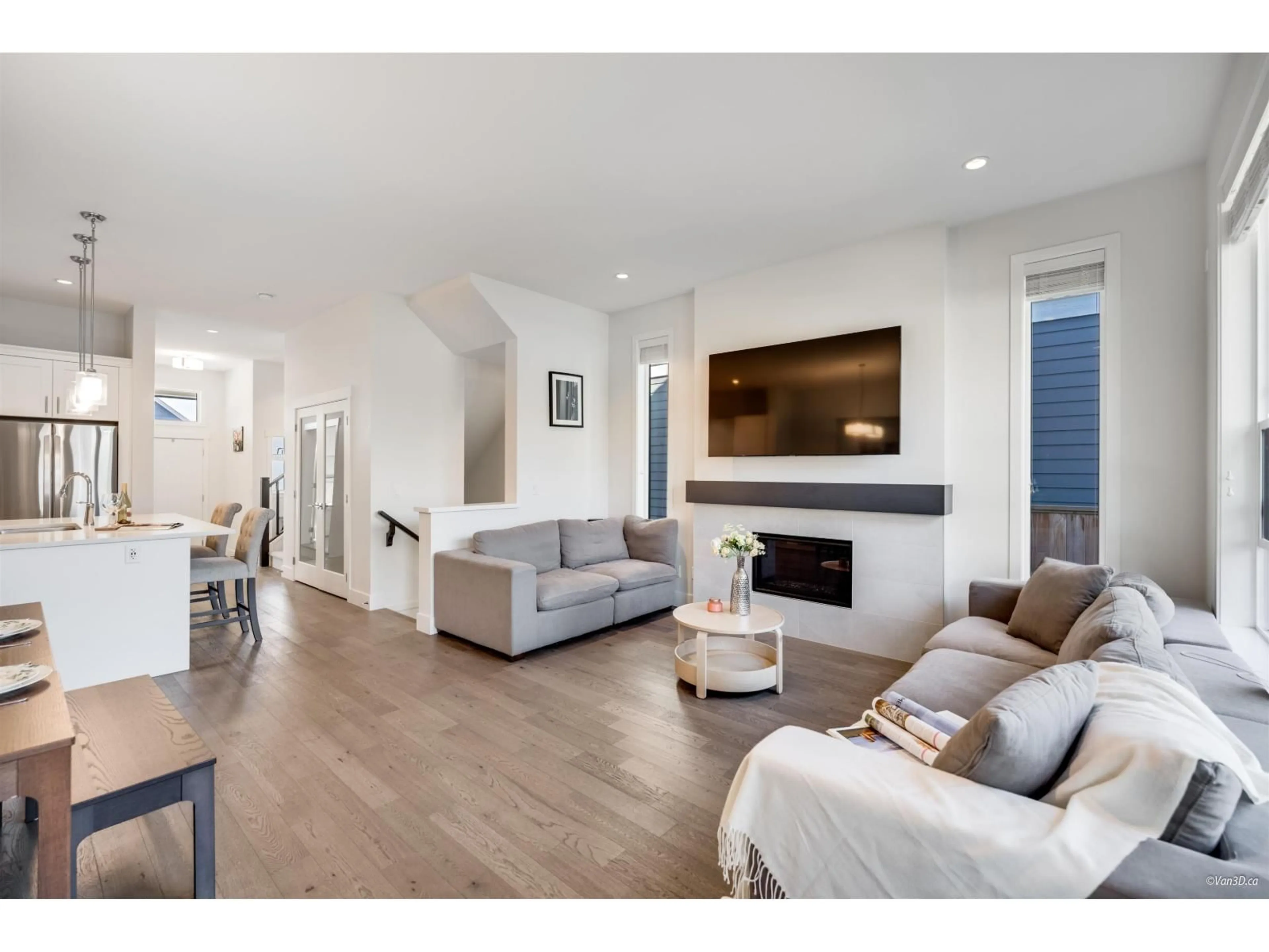Living room with furniture, wood/laminate floor for 16623 21A, Surrey British Columbia V3Z9X9